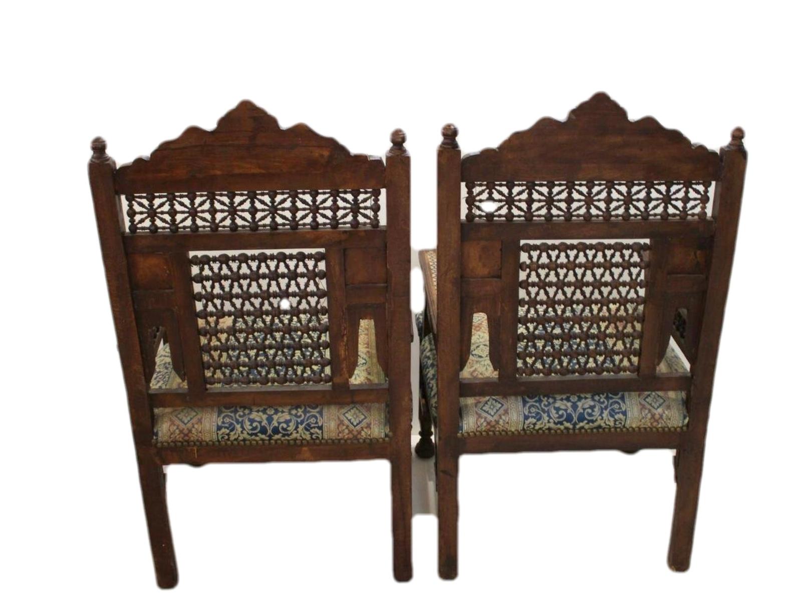 Pair of Middle Eastern Syrian (20th Cent) side chairs in walnut with inlaid bone, mother of pearl and ebony with spindle & ball and finial details (matching 2 arms & settee