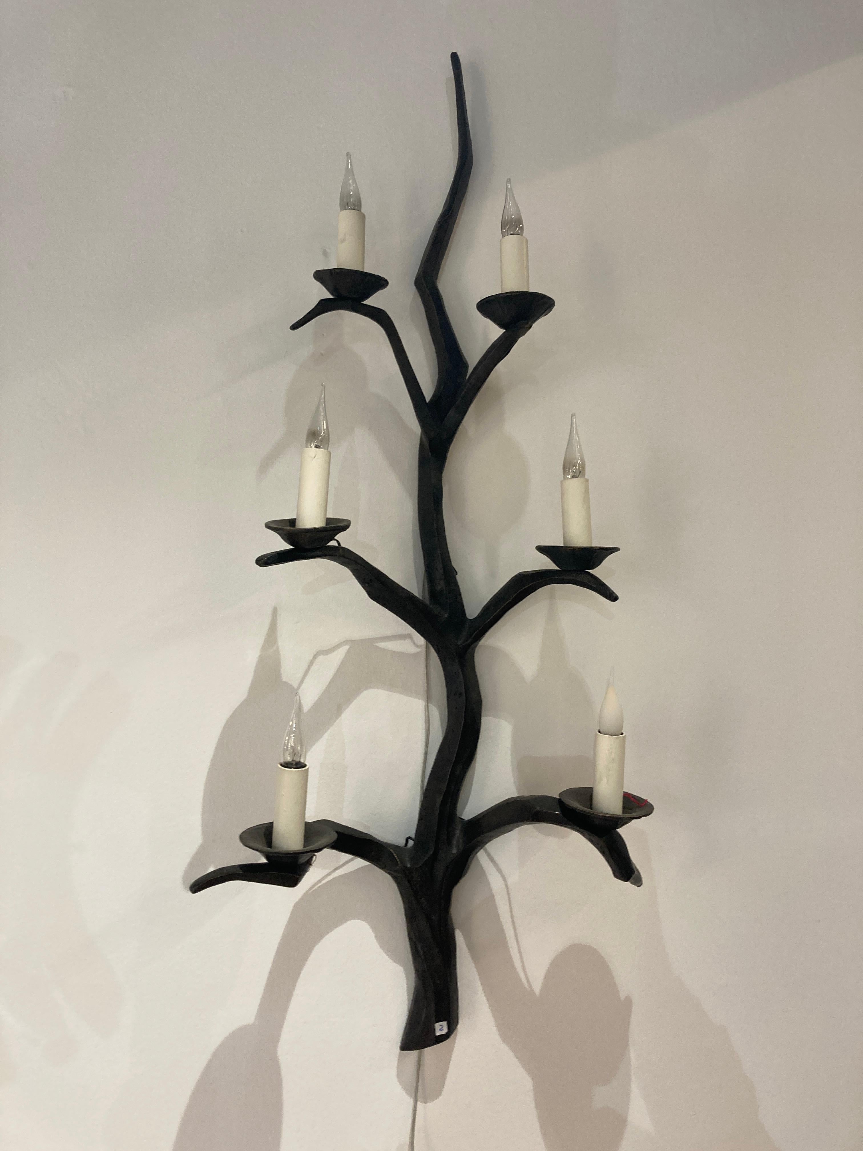 Very nice pair of tall bronze sconces
in the style of Felix Agostini
France
1960's