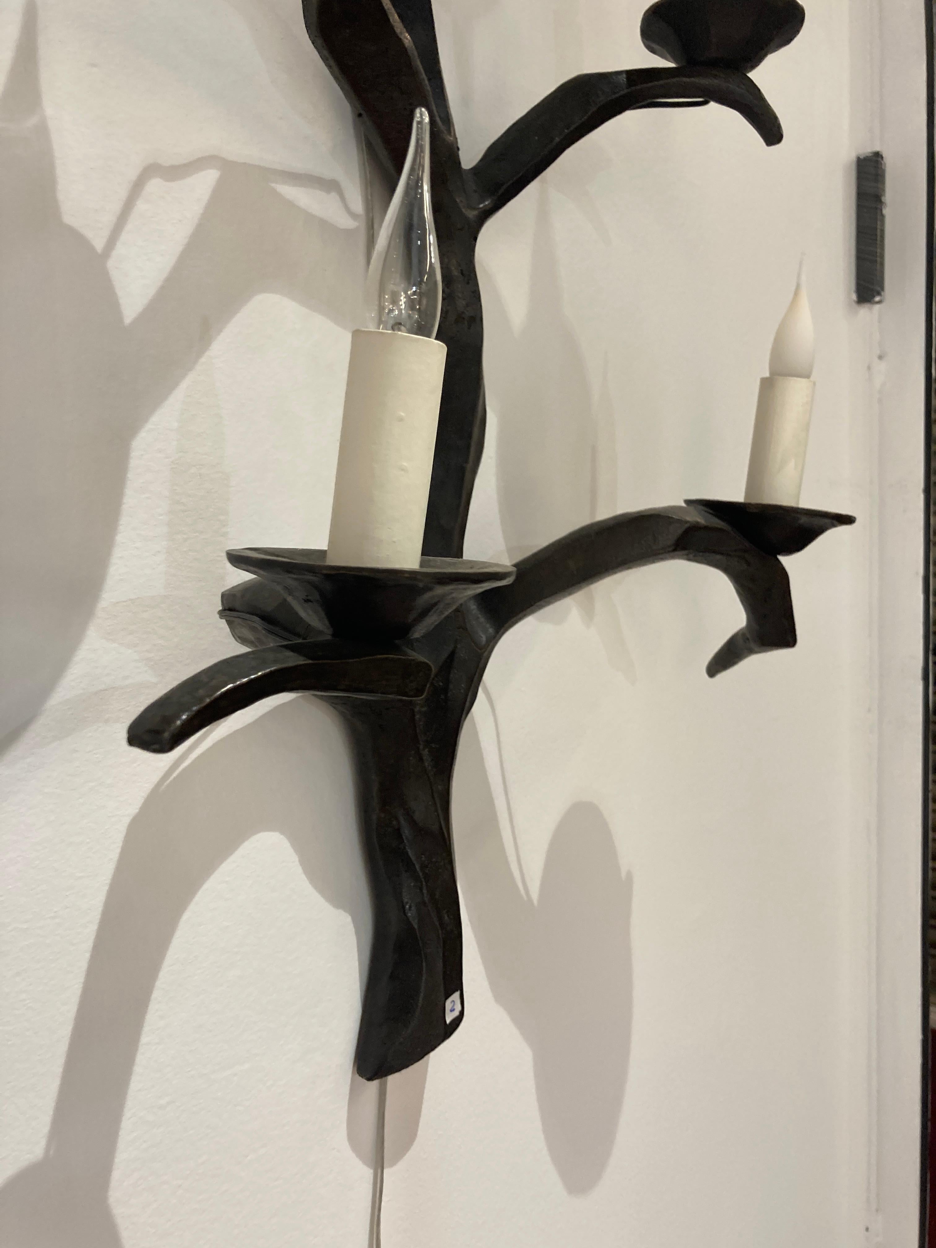 Mid-20th Century Pair tall bronze sconces in the style of Felix Agostini For Sale