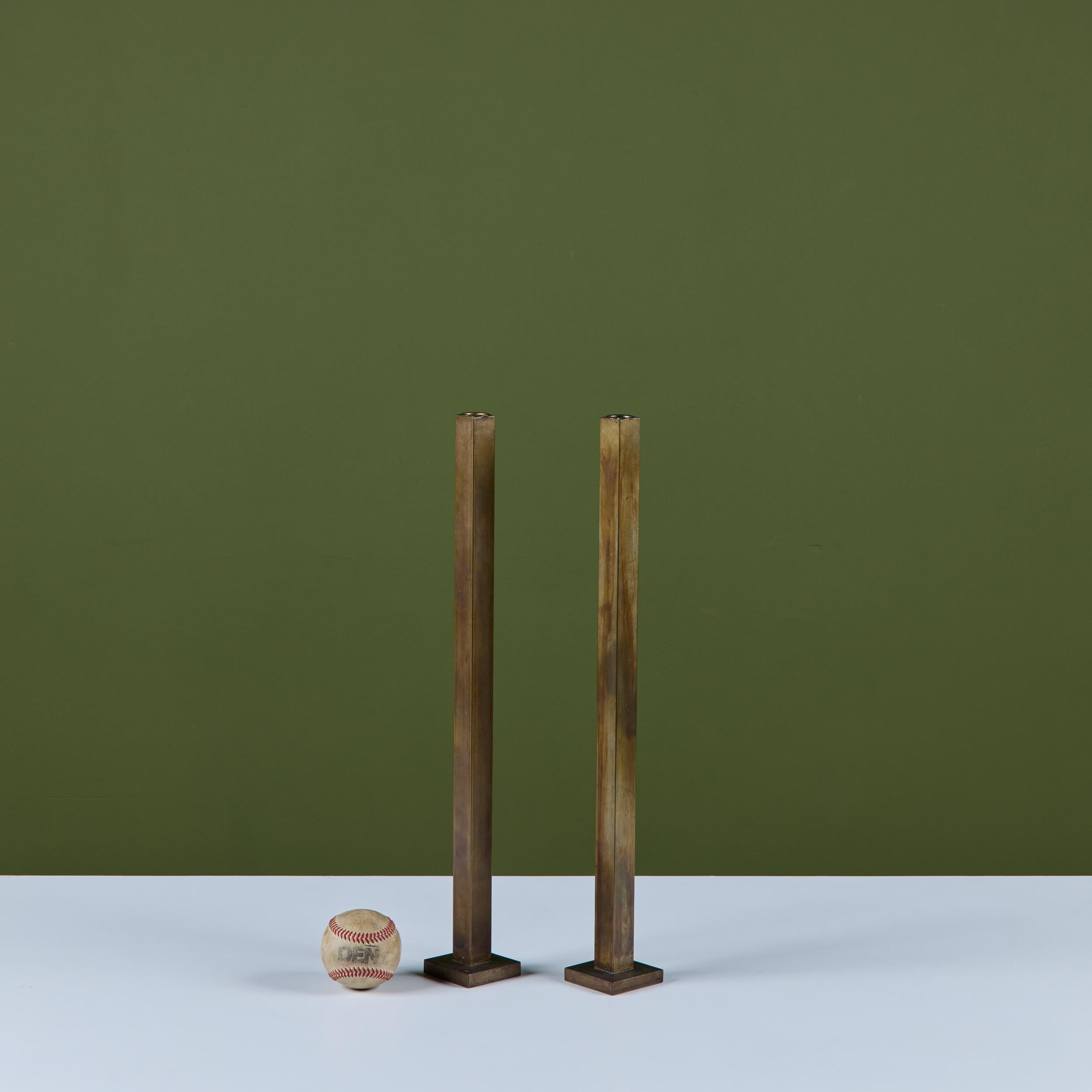 Canadian Pair Tall of Brass Candlesticks by Martha Sturdy For Sale