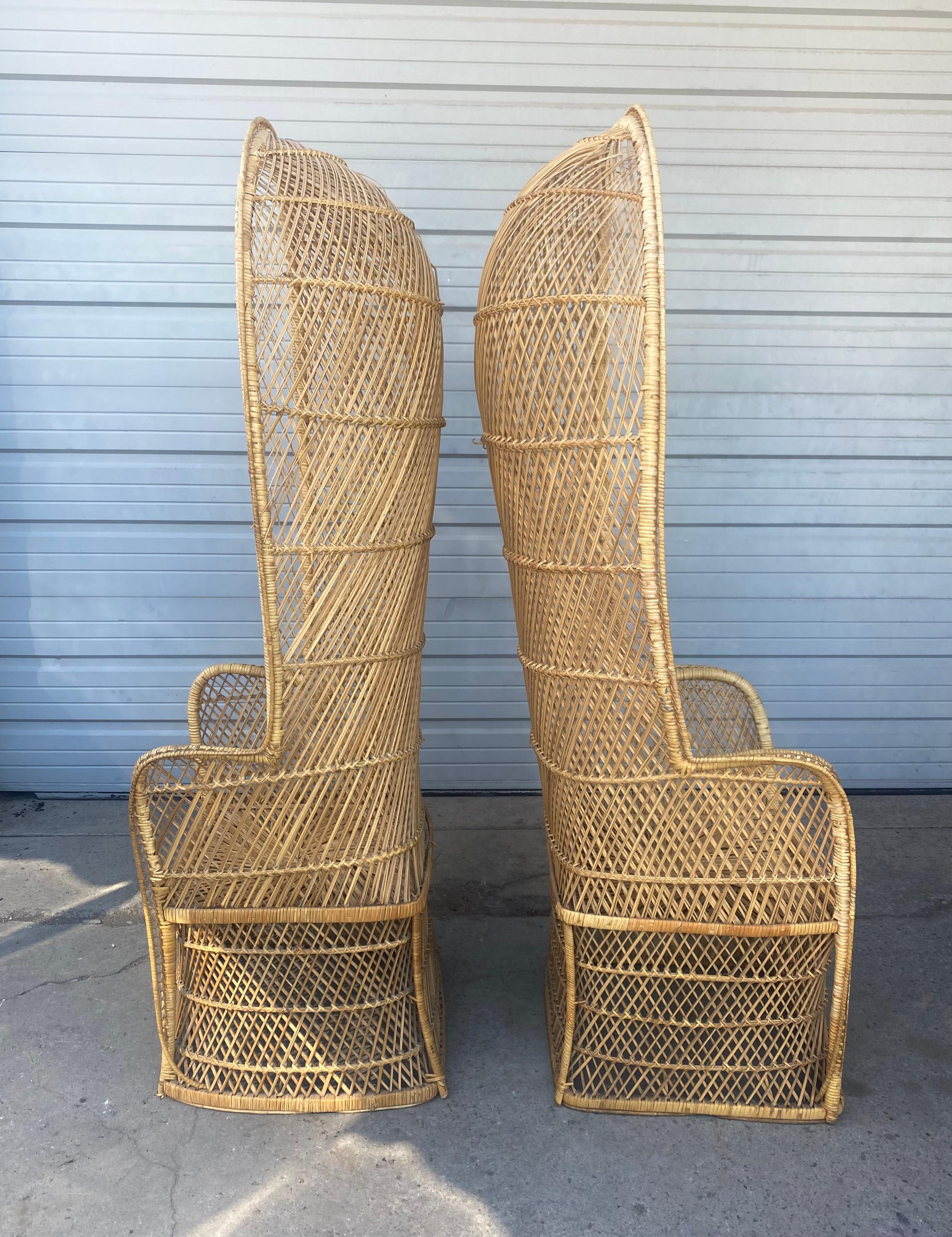 Matched Pair Tall Rattan Wicker Porters Style Peacock Chairs,,, classic mid century modern design,, minor breaks to wicker,, Hand delivery avail to New York City or anywhere en route from Buffalo NY