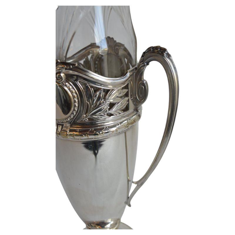 Pair Tall Silver Urn form vases with glass insert.