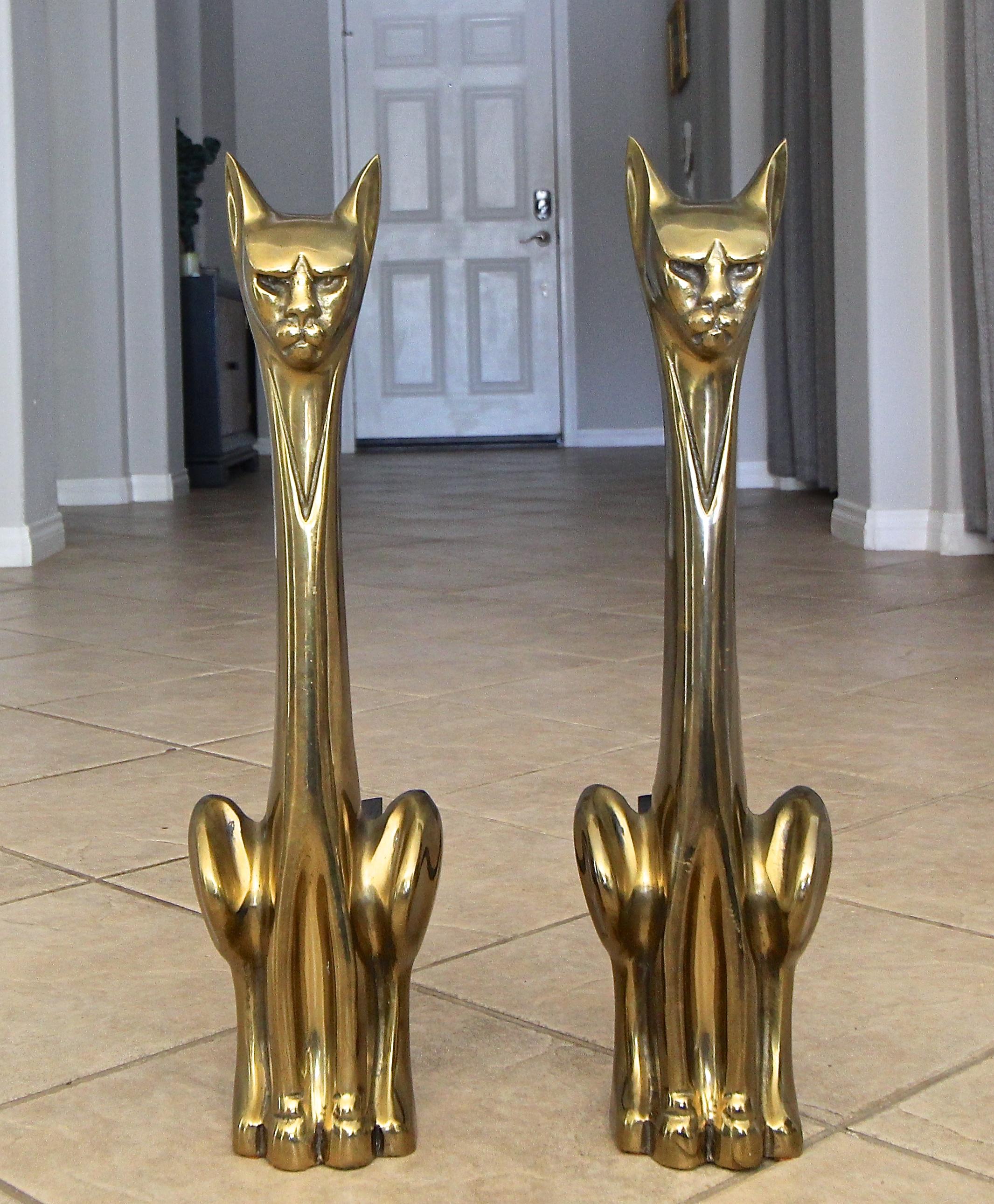 Pair of tall stylized solid brass Siamese cat fireplace andirons. Good vintage condition with age appropriate patina.