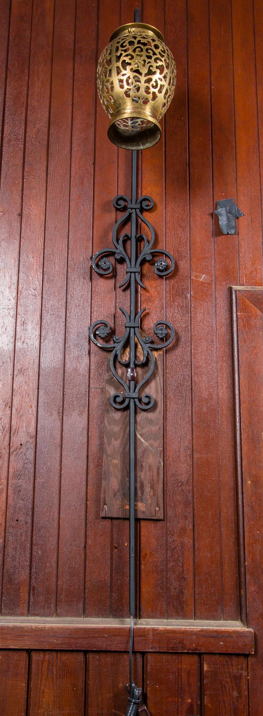 Pair of Tall Wrought Iron Wall Sconces with Hanging Brass Moroccan Lanterns In Excellent Condition For Sale In Stamford, CT