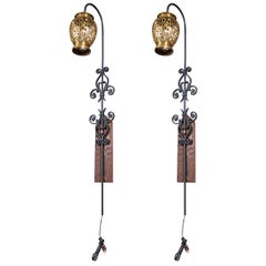 Vintage Pair of Tall Wrought Iron Wall Sconces with Hanging Brass Moroccan Lanterns