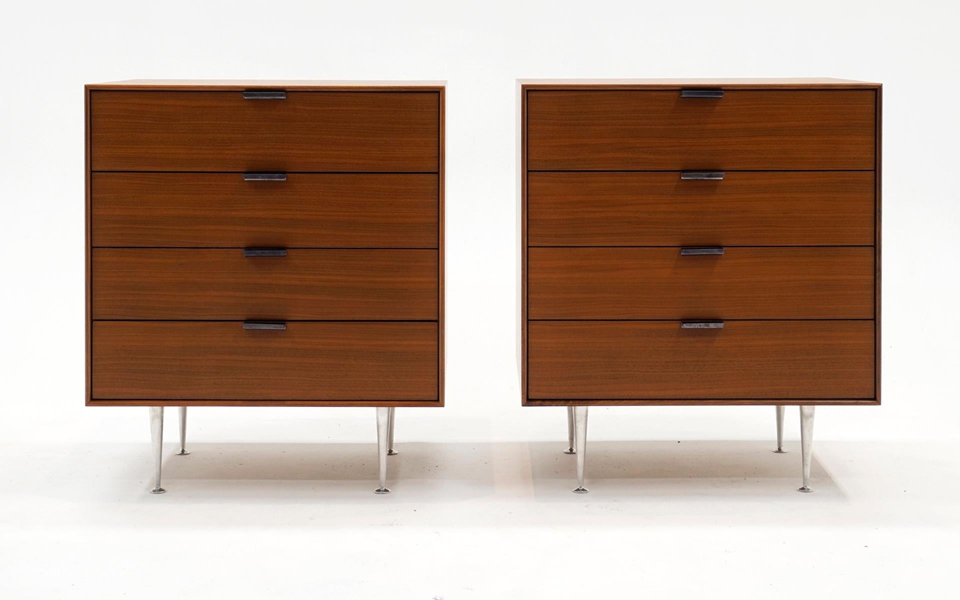 Pair of George Nelson & Associates for Herman Miller Thin Edge cabinets model 4701. Teak cases with anodized aluminum pulls and cast aluminum legs. Each cabinet features four drawers. Signed with the Metal disc manufacturer's label to top-right