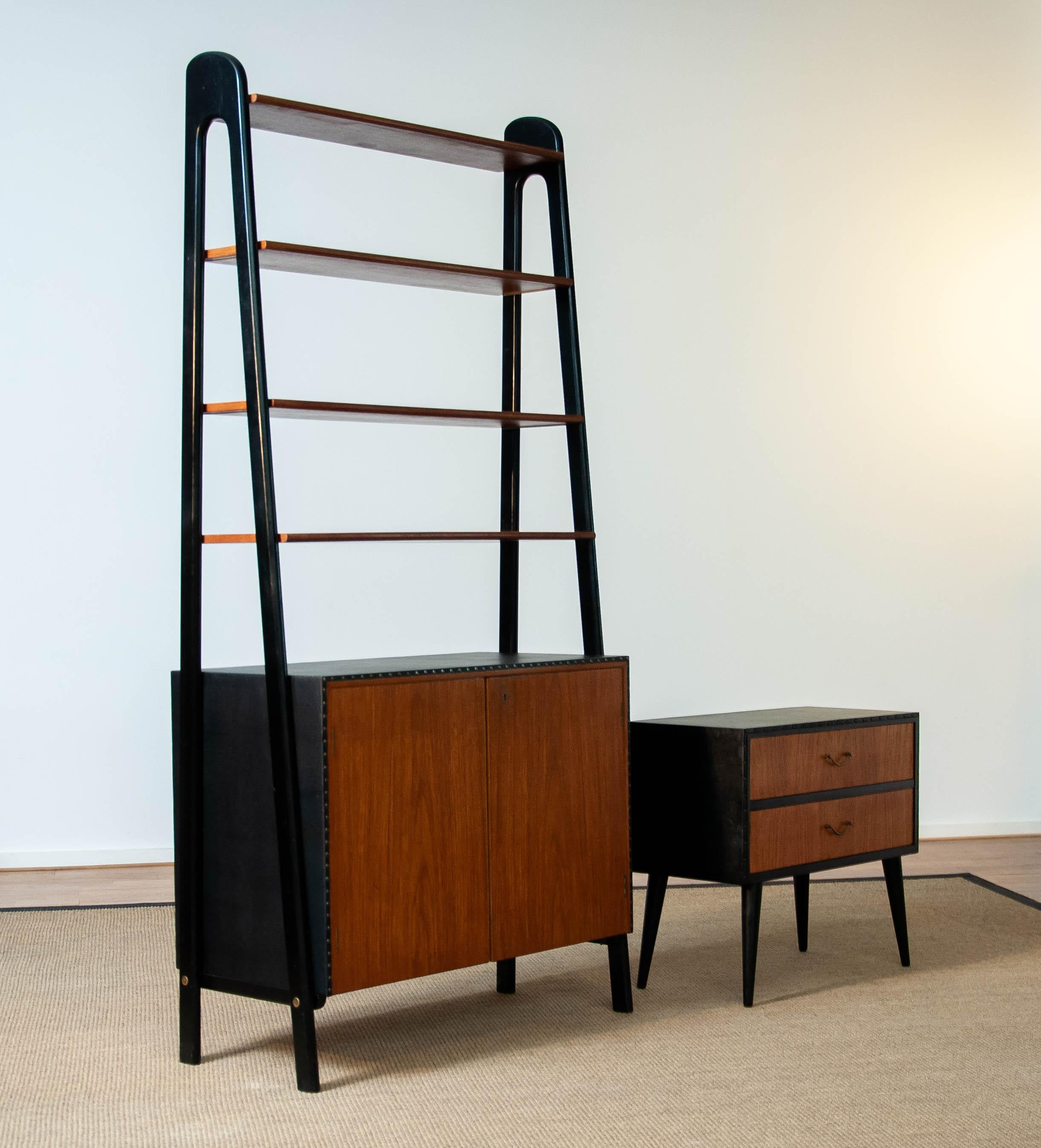 Scandinavian Modern Pair Teak Nailed Black Faux Leather Bookcase and Cabinet by Bertil Fridhagen