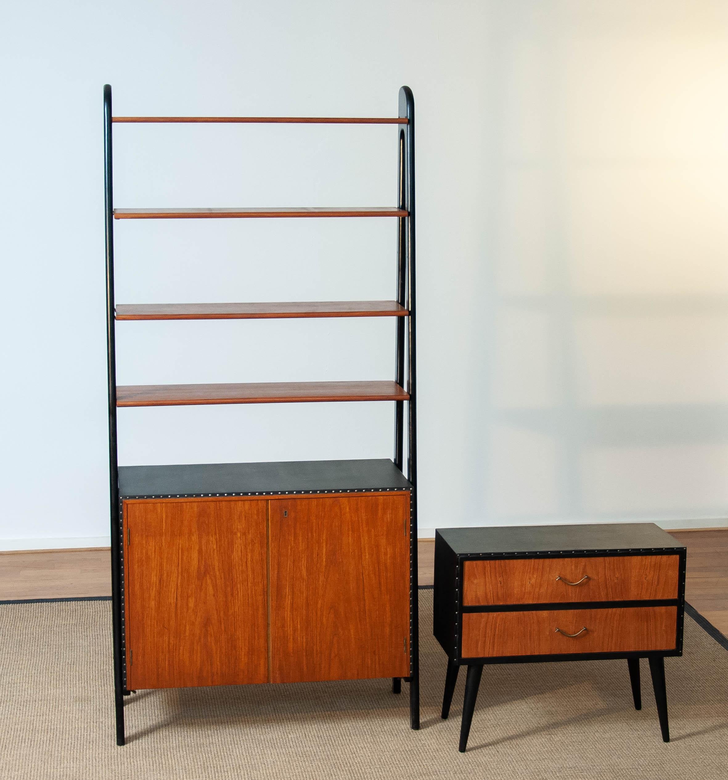 Swedish Pair Teak Nailed Black Faux Leather Bookcase and Cabinet by Bertil Fridhagen