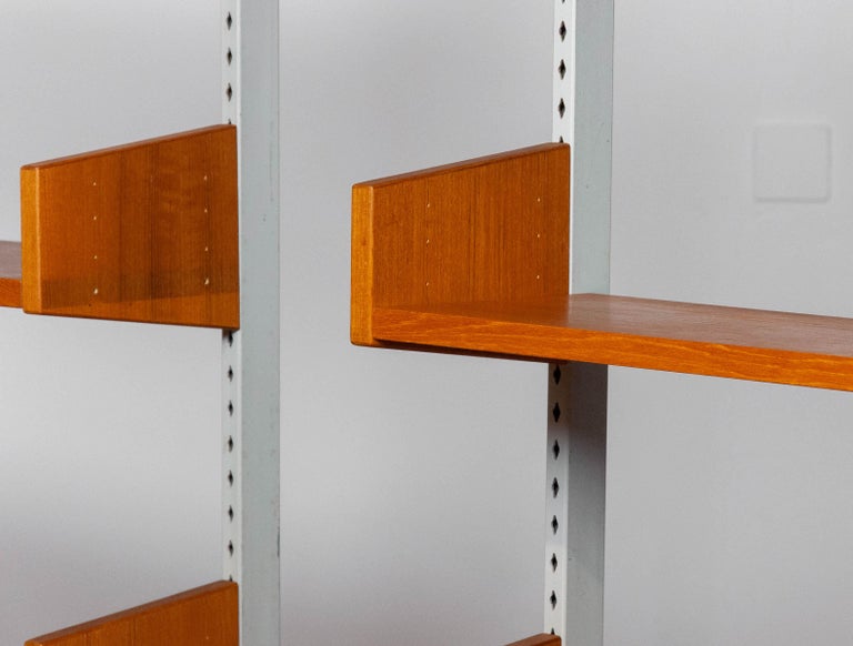 Pair Teak Shelf Systems Bookcases with Steel Bars by Harald Lundqvist