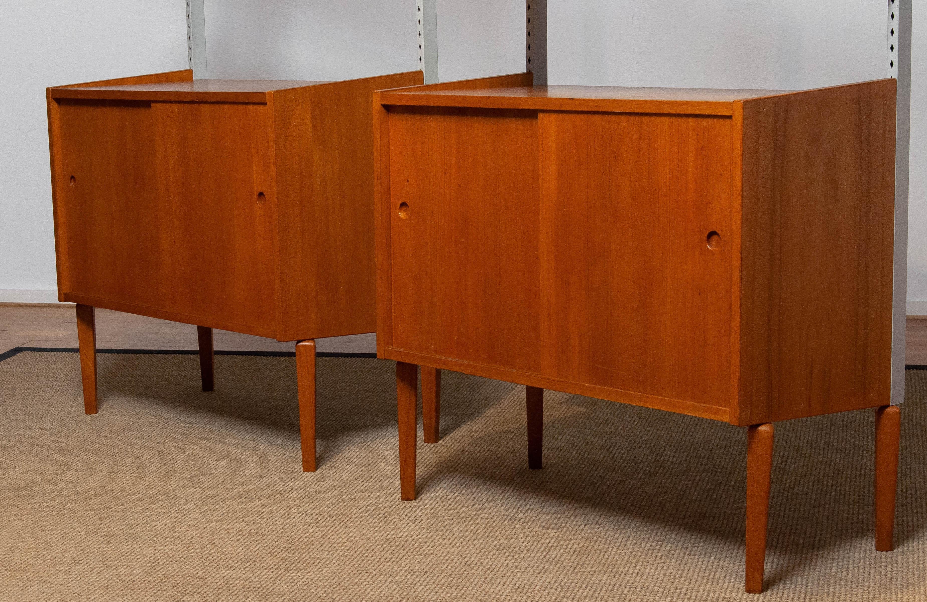 Mid-Century Modern Pair Teak Shelf Systems Bookcases with Steel Bars by Harald Lundqvist for Lizzy