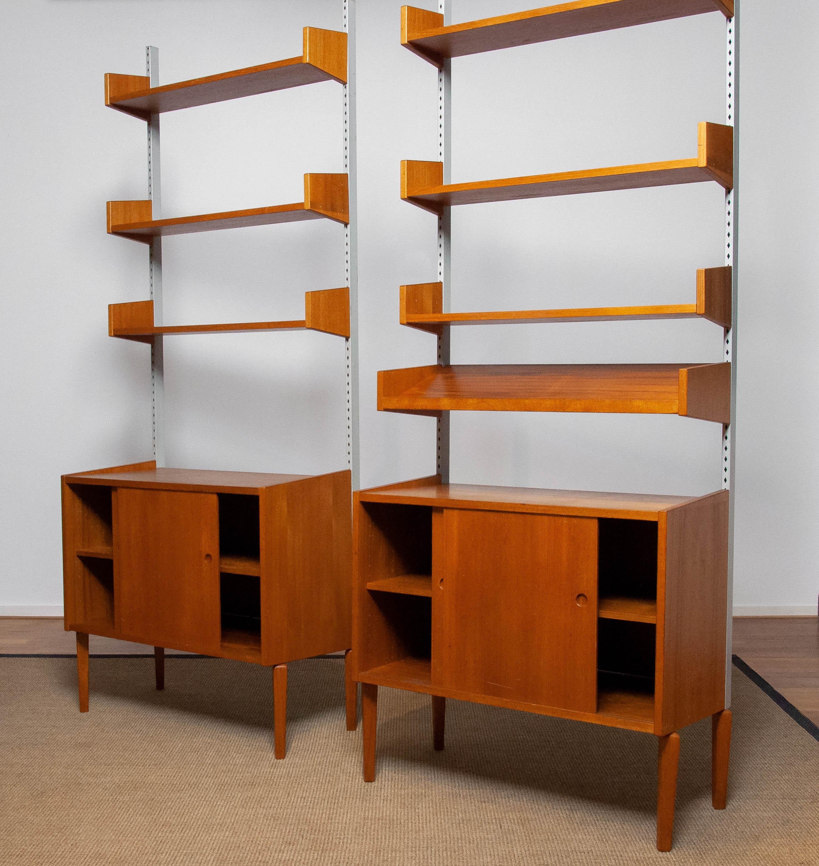 Mid-20th Century Pair Teak Shelf Systems Bookcases with Steel Bars by Harald Lundqvist for Lizzy