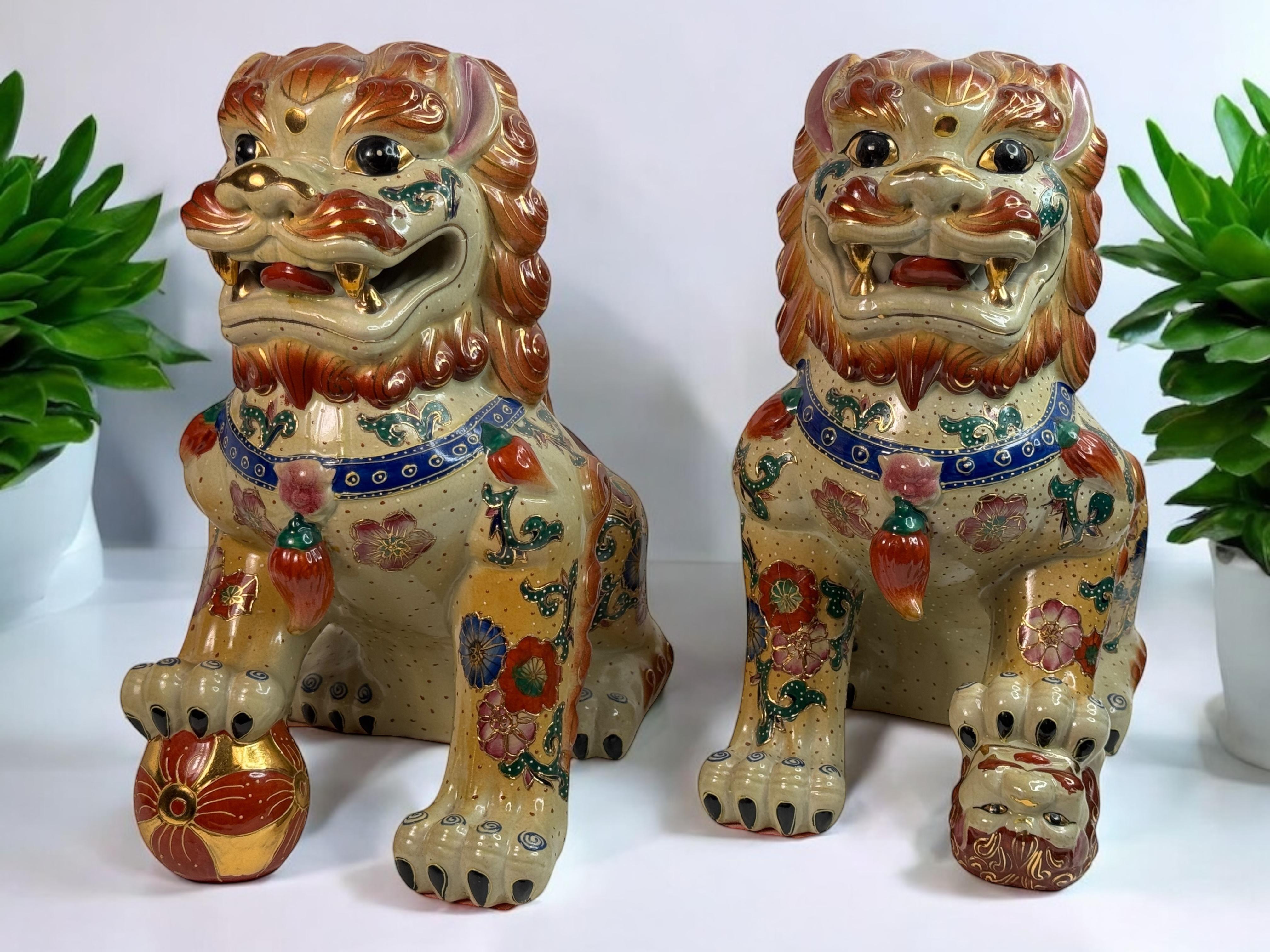 An outstanding pair of two Foo Dog statues in glazed and hand painted Ceramic. Perfectly representations of this majestic being, stern, watchful and obedient at the same time.
Elegant and of impressive size, the quintessence of figurative statues.