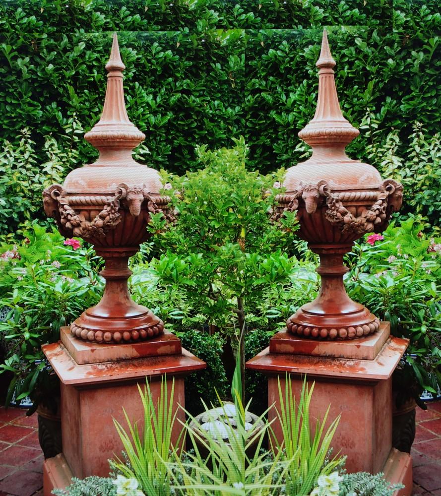 You are viewing a gorgeous pair of English terracotta garden stands on pedetal bases
Perfect for that classical English garden look
The top part - the finial - comes apart from the square pedestal stand in sits on 
This is for a pair but we would be
