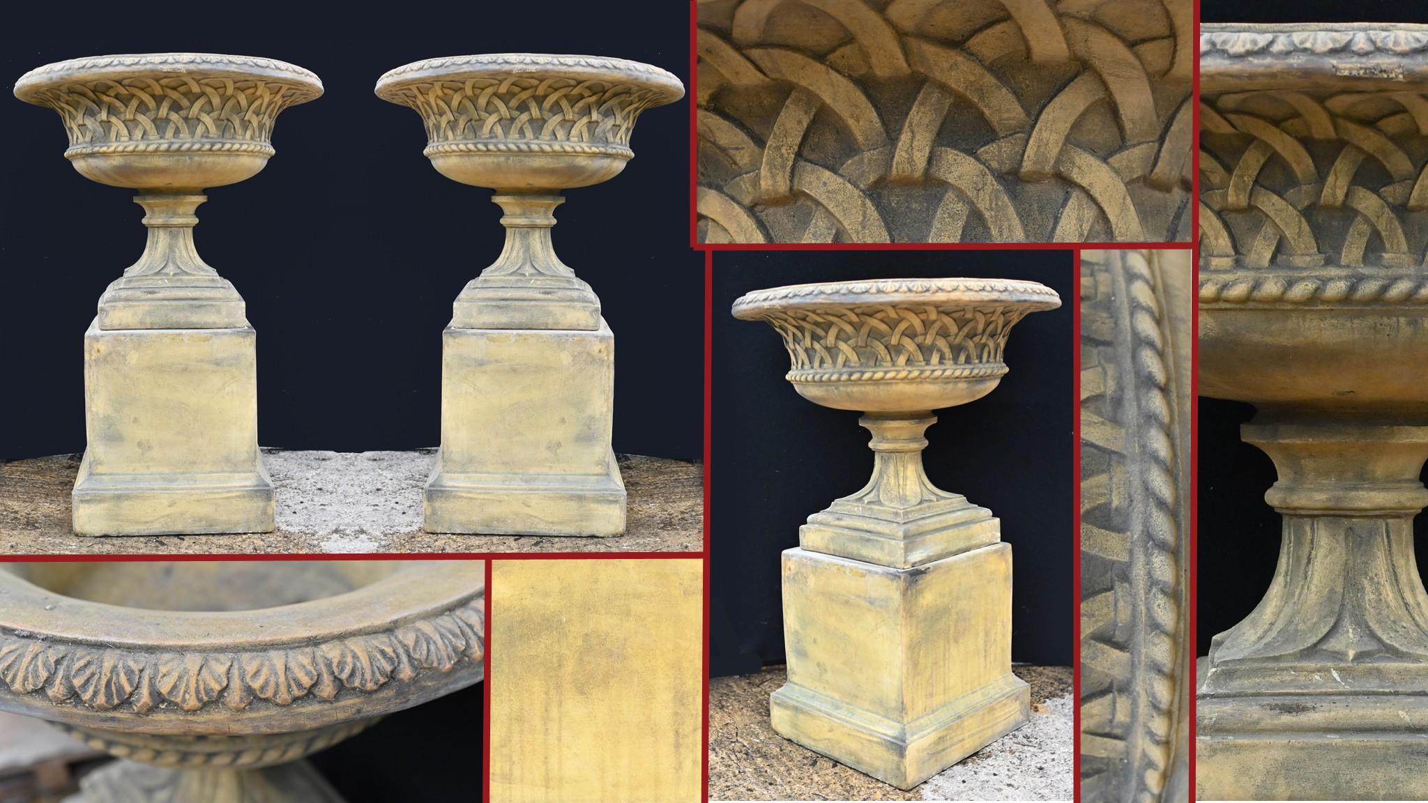 Pair of gorgeous terracotta garden urns on pedestal base
Classic campana form and adorned with Celtic gothic motifs
Great pair for the garden, can you imagine how these would look overflowing with flowers? 
Please let us know if you would like to