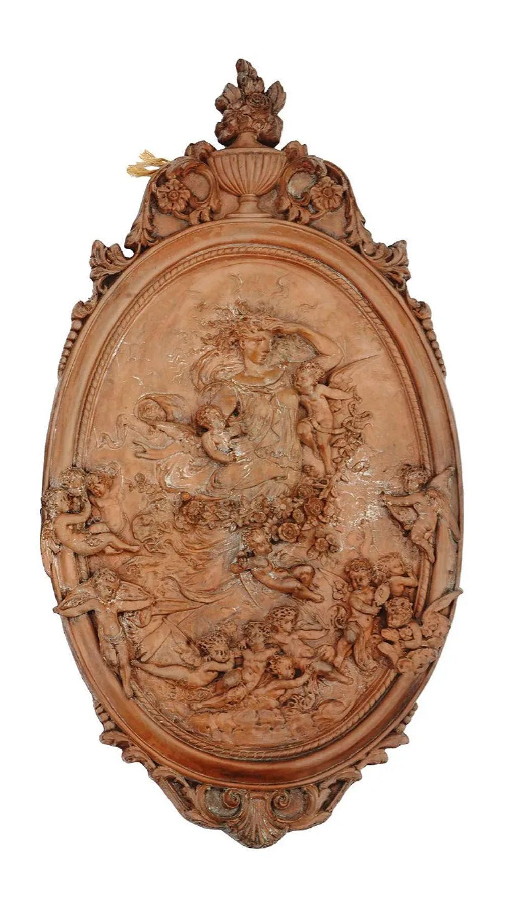 Neoclassico Coppia di placche in terracotta neoclassica a bassorilievo raffiguranti una dea e degli angeli in vendita