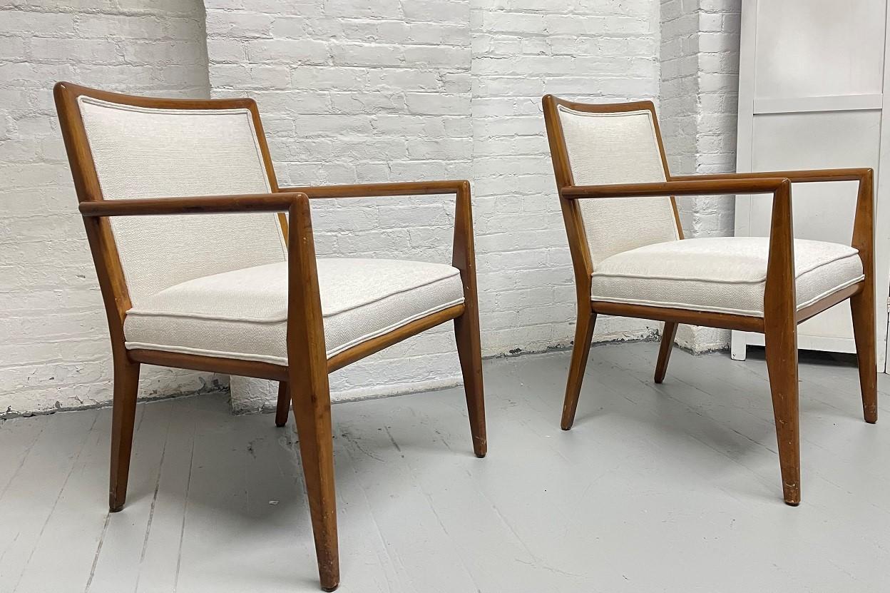 Pair T.H. Robsjohn-Gibbings armchairs for Widdicomb. Solid walnut frames and newly upholstered.