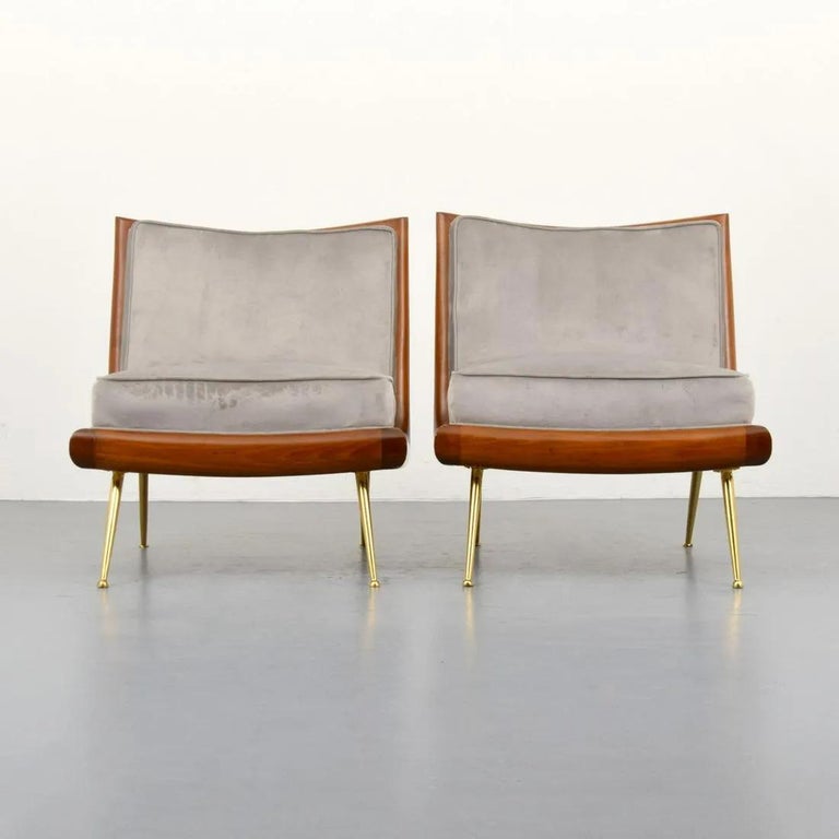 Pair of T.H. Robsjohn-Gibbings design for Widdicomb. The chairs are upholstered in ultra-suede fabric. The chairs have a walnut frame with brass splayed legs.