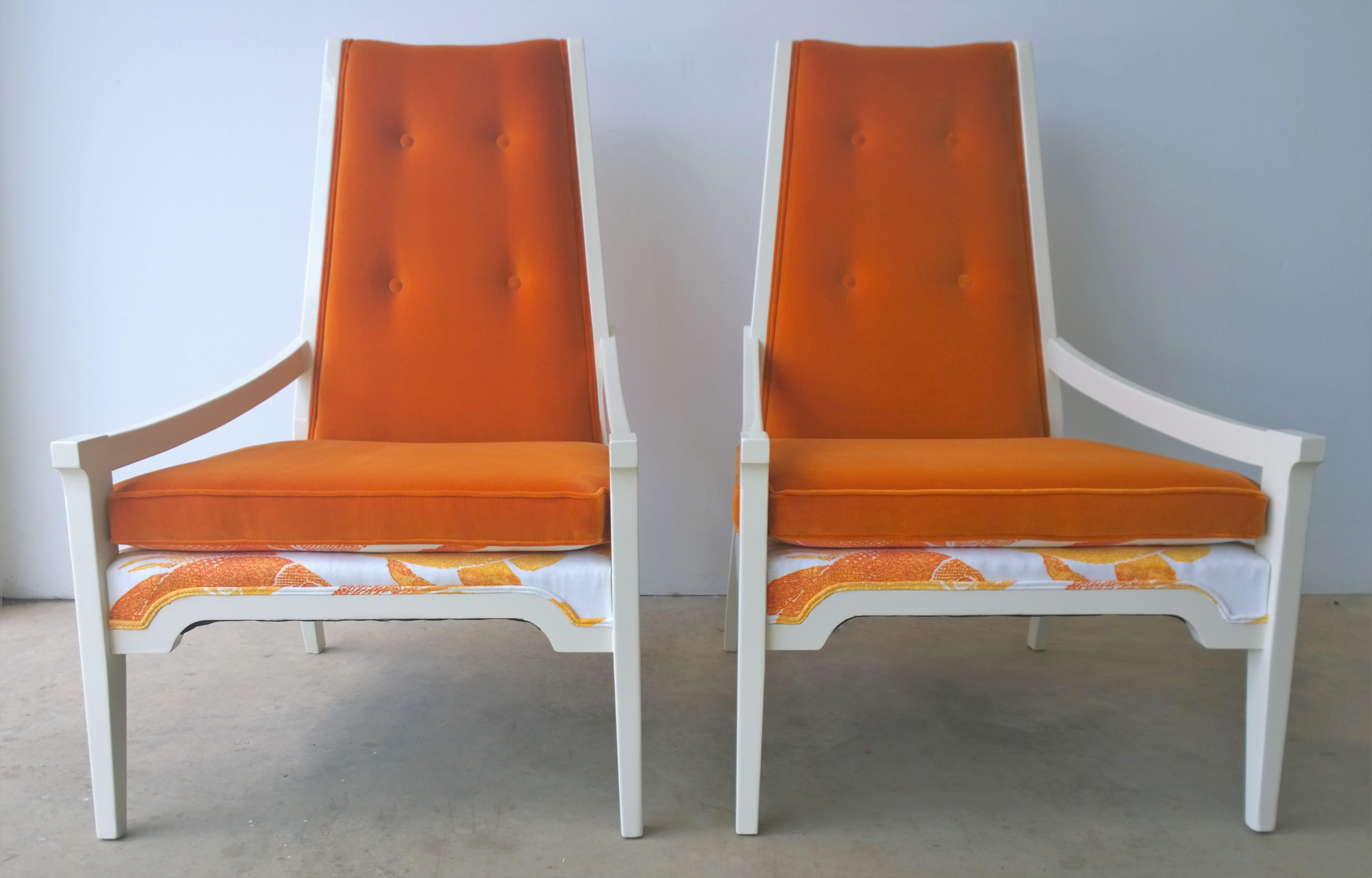 Offered is a pair of Mid-Century Modern beyond gorgeous, whimsical yet very elegant, white lacquered pair of armchairs in the manner of T.H. Robsjohn-Gibbings. Stunning in a button tufted, persimmon orange, lush velvet with Japanese Koi in tangerine