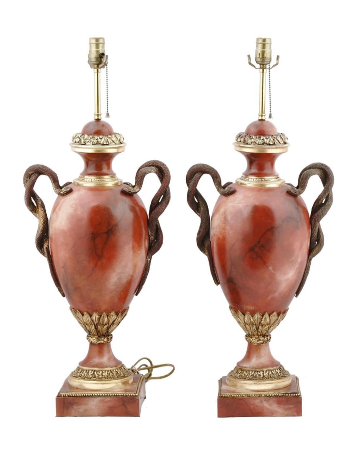 Pair of very large (31 inch) vintage table lamps from the prestigious firm of Thomas Blakemore Ltd., formerly of Walsall, England, near Staffordshire.  Crafted from cast and carved composition with hand-painted finish to mimic the appearance of