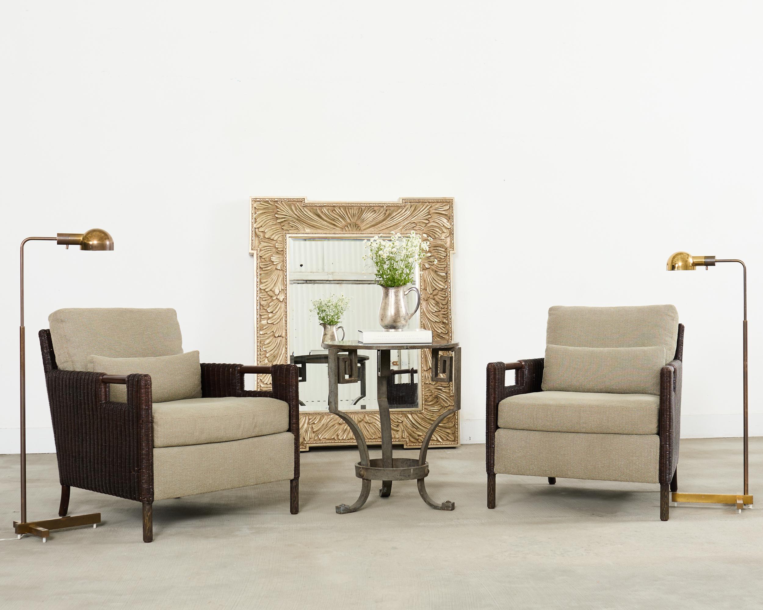 Rare pair of large lounge chairs or club chairs designed in the California coastal organic modern taste by Thomas Pheasant for McGuire. The set includes 2 lounge chairs and 1 matching ottoman measuring 30 inches wide and 22 inches deep. The chairs