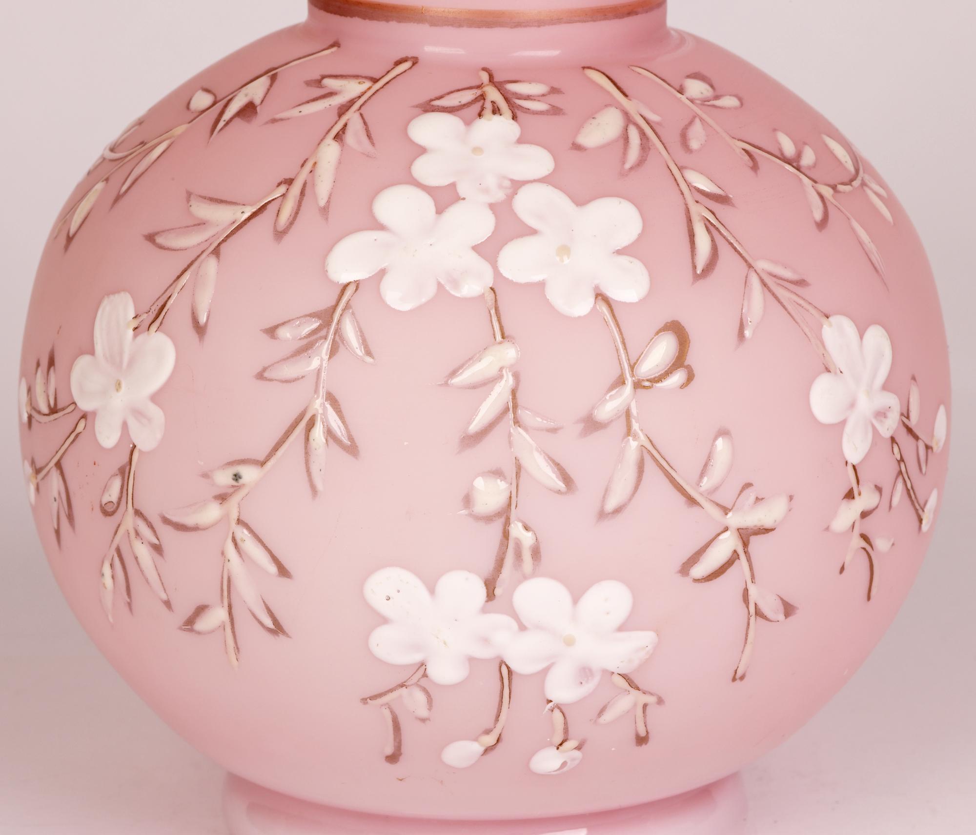 Pair Thomas Webb pink satin floral decorated glass vases 

A very fine pair hand-blown Aesthetic Movement pink satin glass vases decorated with applied white flowers made by Thomas Webb and dating from around 1880. Acquired as attributed to the