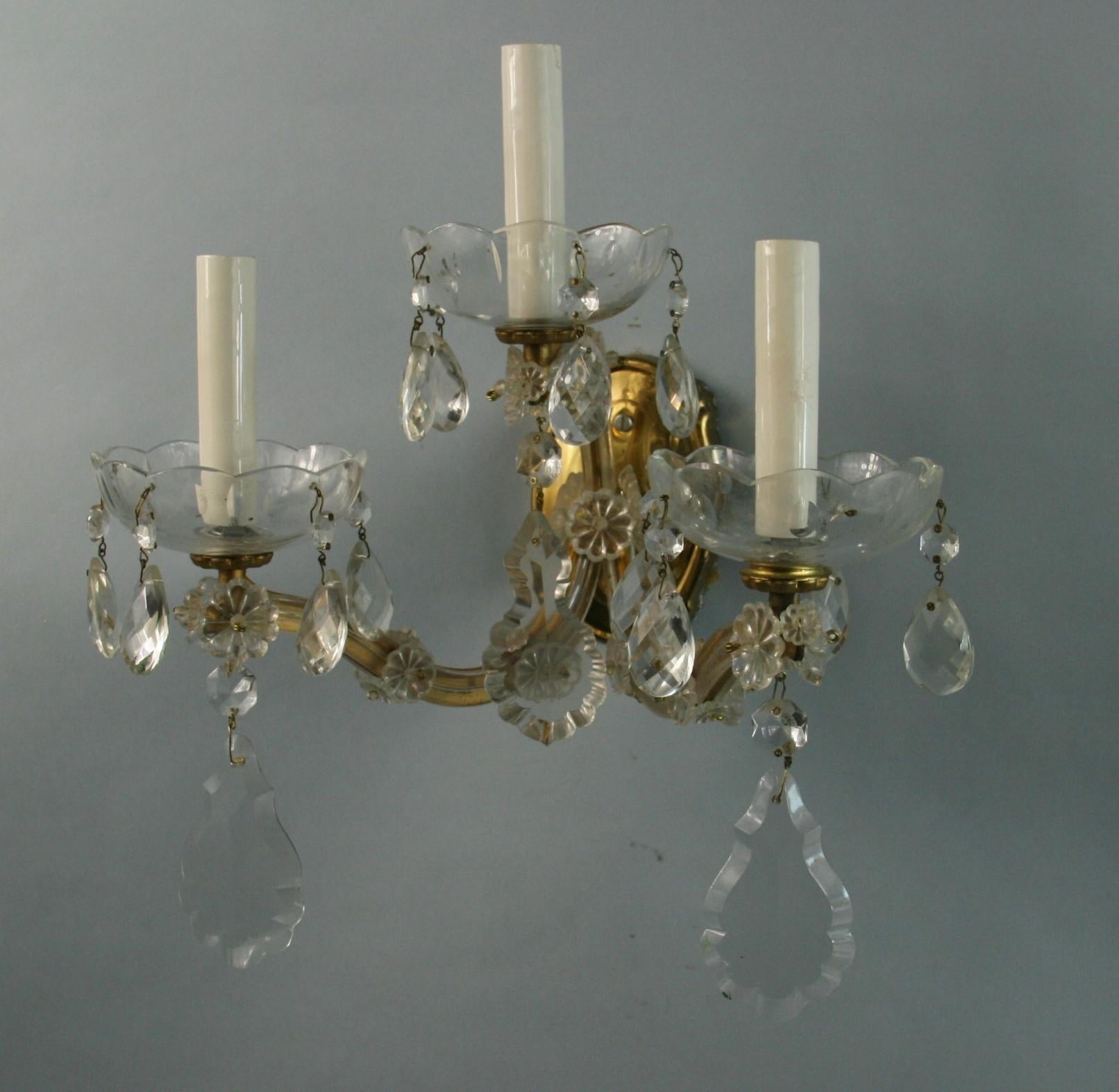 3-740 Pair three light crystal and brass sconces.
