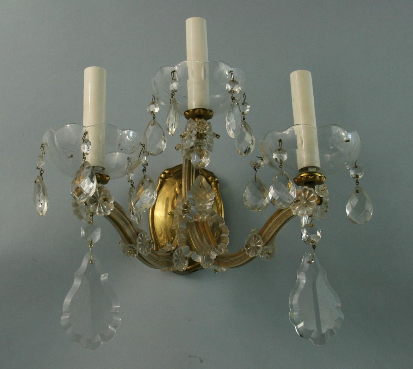 Pair Three Light Maria Theresa Crystal and Brass Sconces In Good Condition For Sale In Douglas Manor, NY