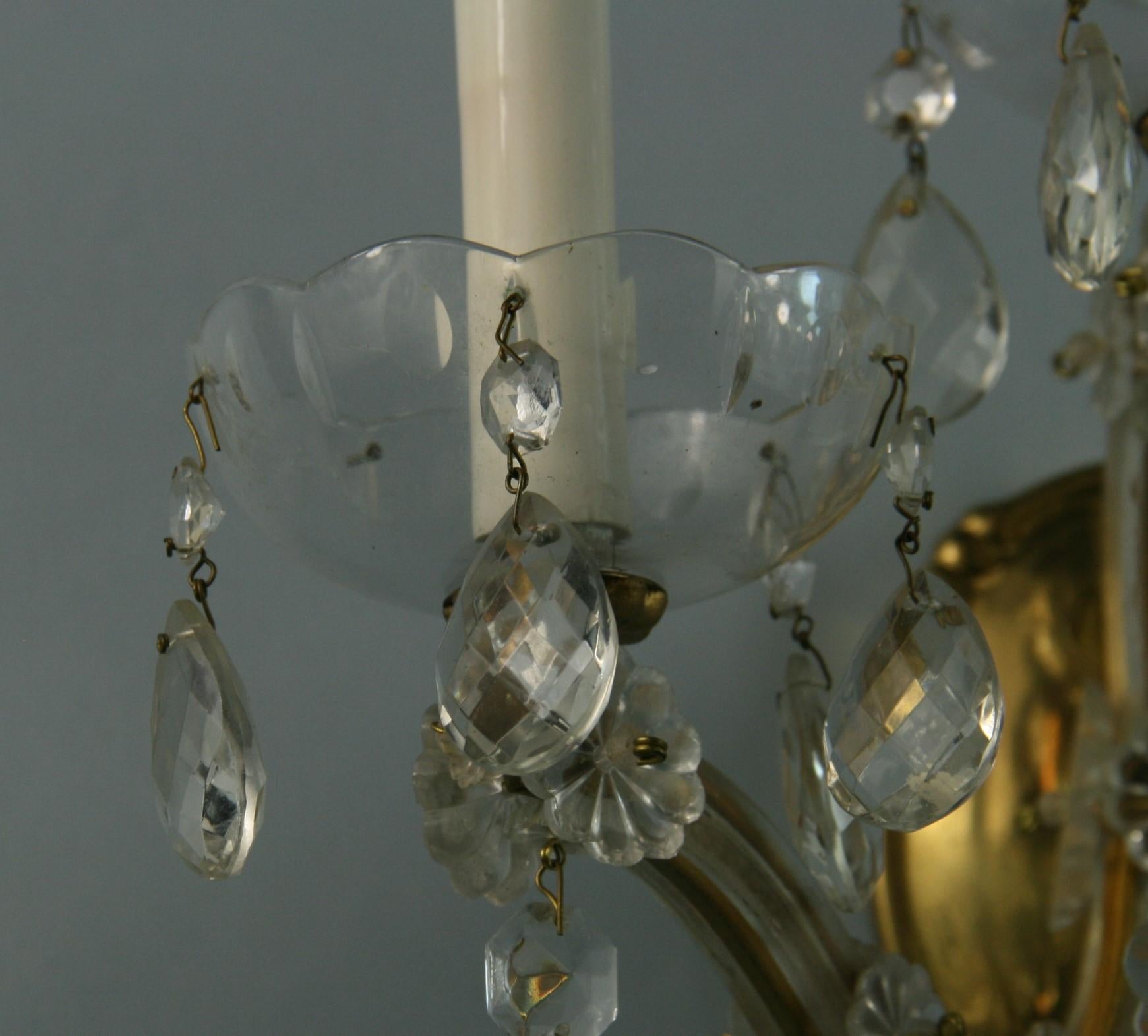 Mid-20th Century Pair Three Light Maria Theresa Crystal and Brass Sconces For Sale