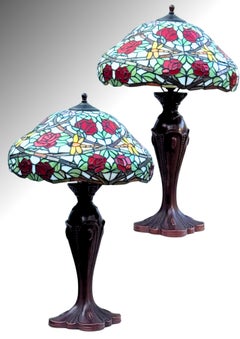 Pair Tiffany Style Art Nouveau Stained Glass Table Lamps with Cast Bronze Bases