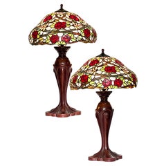 Pair Tiffany Style Art Nouveau Stained Glass Table Lamps with Cast Bronze Bases