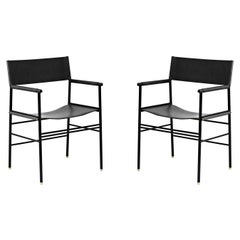 Paire de fauteuils contemporains intemporels en cuir noir et métal en caoutchouc noir