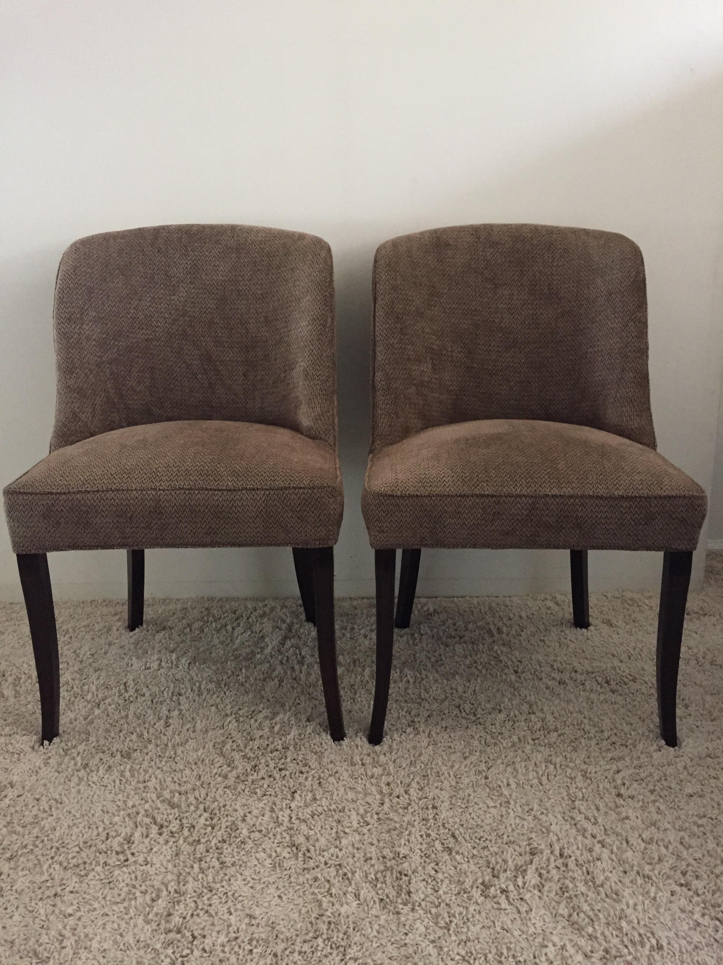 Pair of Tommi Parzinger for Charek modern side chairs/ captains dining chairs. Curved back and spring construction for comfort .