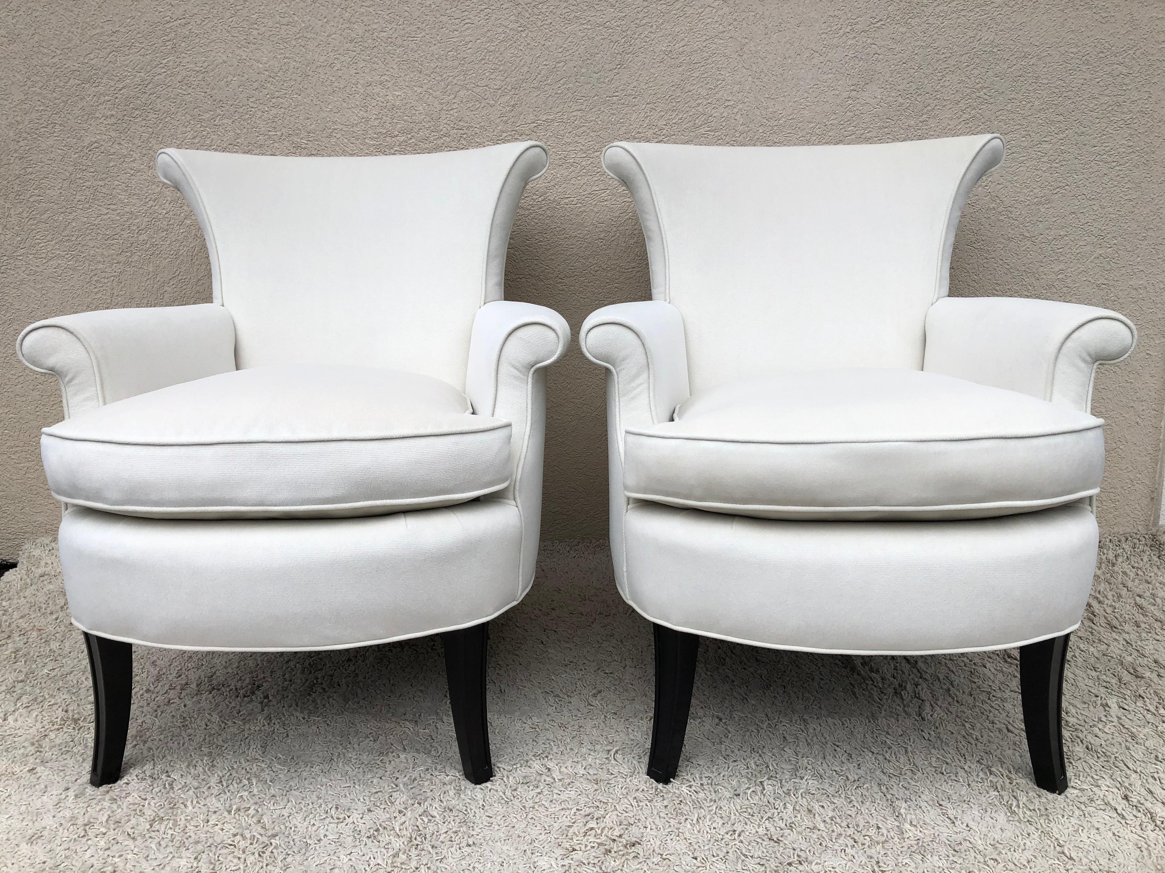Pair of Tommi Parzinger, for Charek modern petite club/slipper arm chairs , in a off white chenille velvet .Original Down cushions .Nice scale and detail the shape.