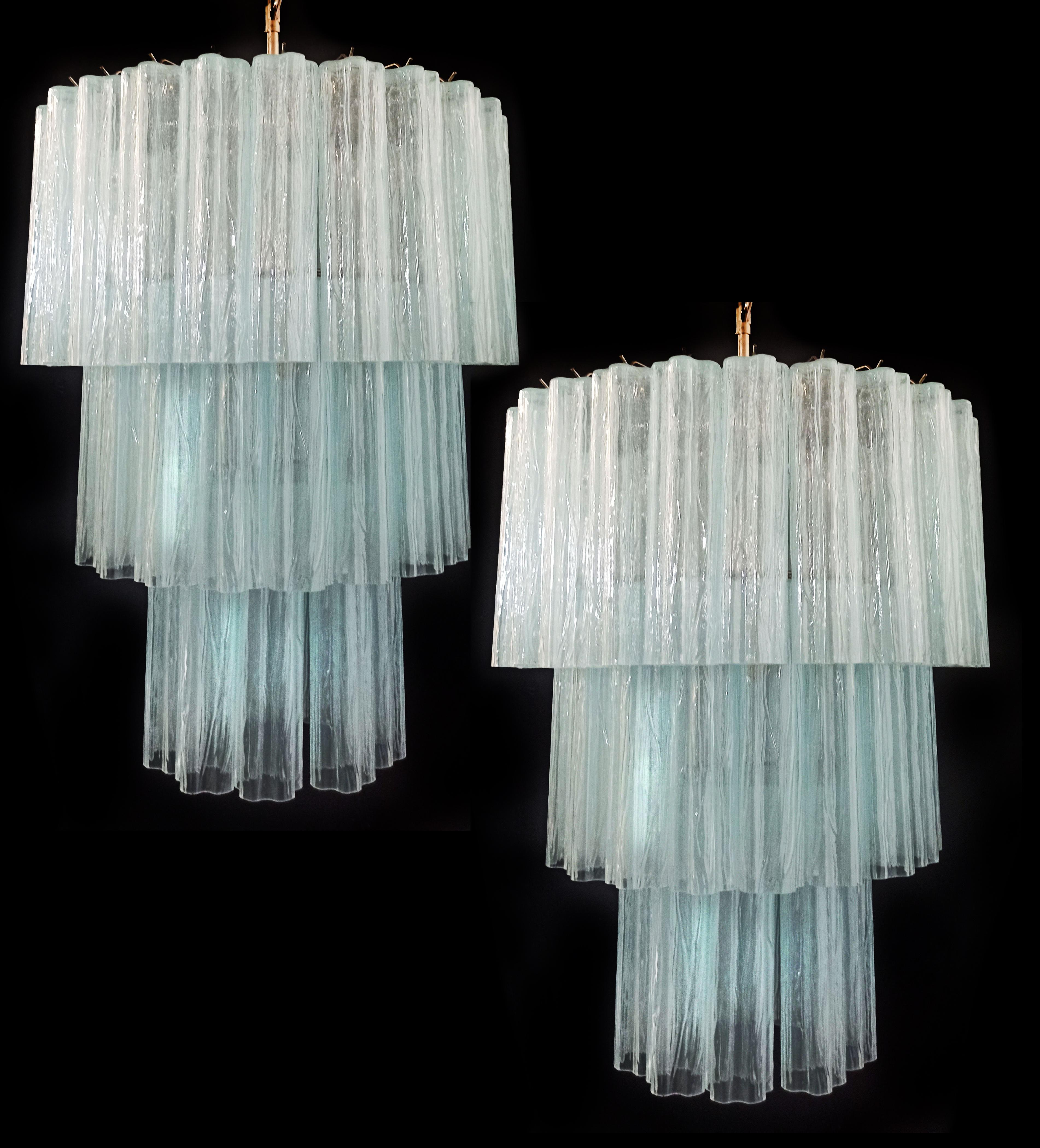Pair Italian vintage chandeliers in Murano glass and nickel-plated metal structure. The armor polished nickel supports 52 large OPAL SILK glass tubes in a star shape.
Period: late XX century
Dimensions: 58,90 inches (152 cm) height with chain;