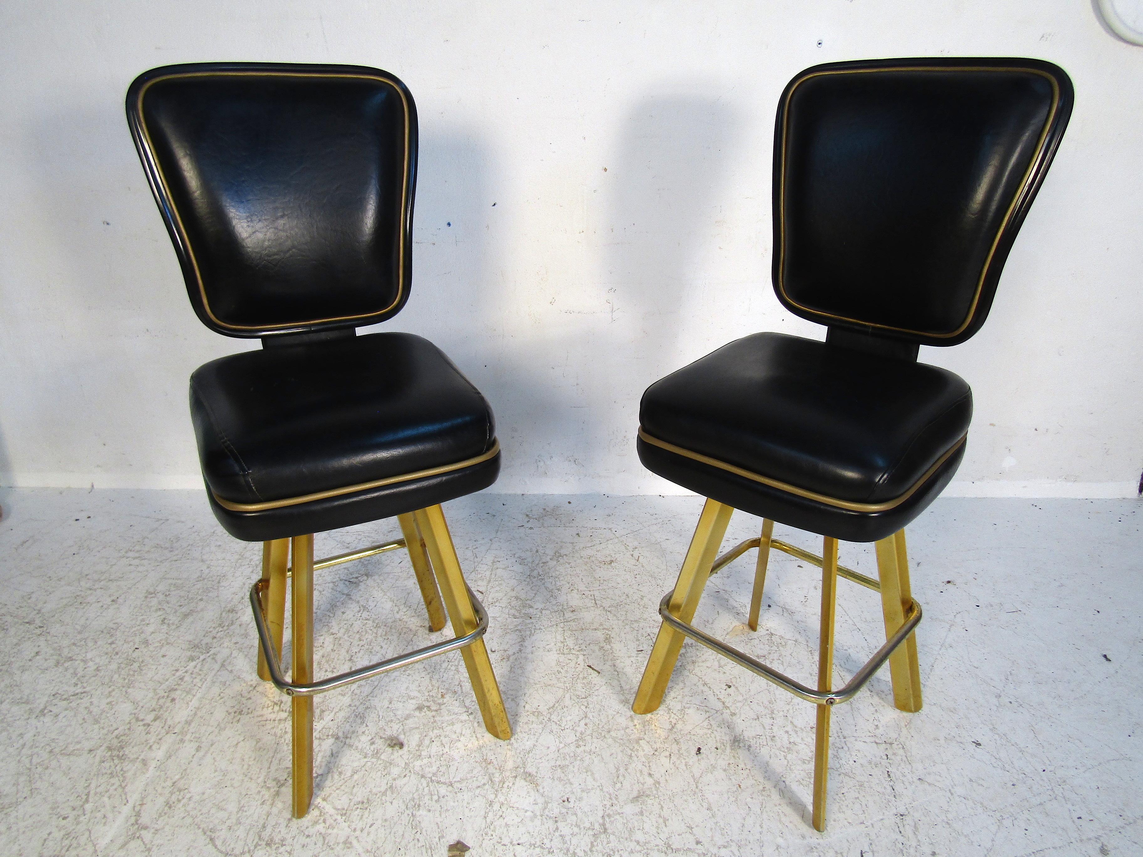 This pair of stools are from the famous Trump Plaza in NYC. Featuring high backs and thick seat cushions these stools are perfect for any home bar or game room. Sturdy brass legs and well-constructed seats will ensure this set will be around for