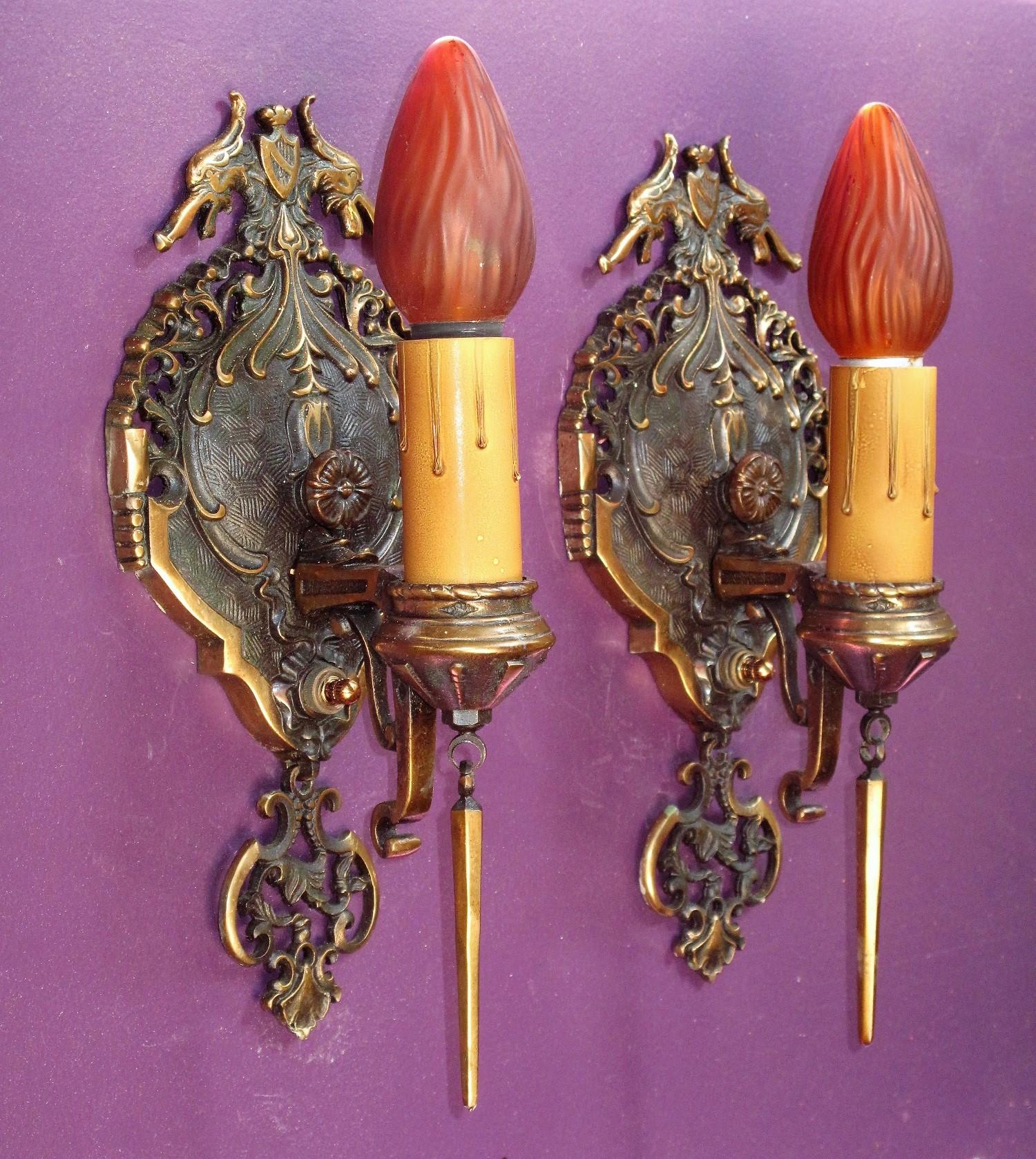 Wonderfully executed solid bronze sconces by Mid-West Chandelier Co., shown in their 1928 catalog. These outstanding sconces retain their original finish and patina with only a soft cleaning and a light wax to protect their already well preserved