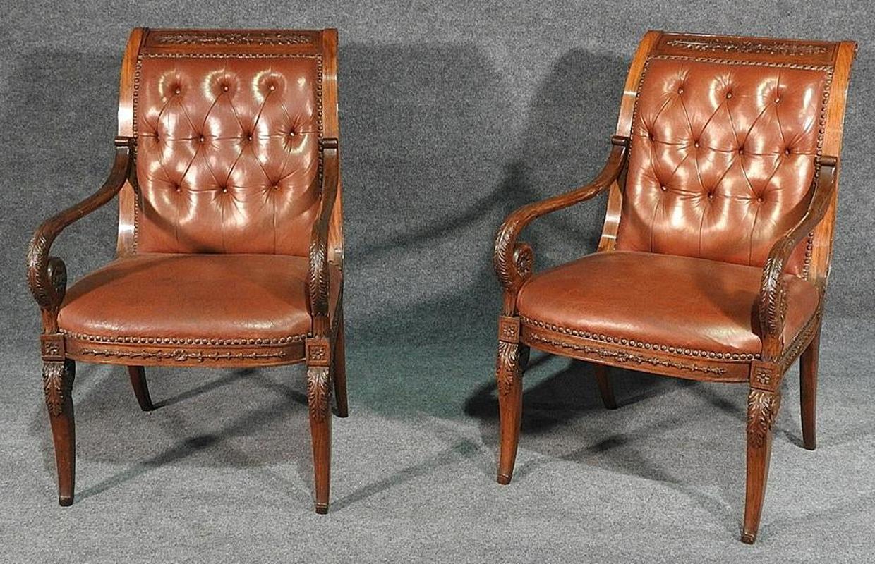 This is a beautiful pair of French Regency leather armchairs that can be used in a study or a living room. They can also be used as head chairs for a dining room or even as guest chairs in an office at the front of a desk. They measure 37 3/4