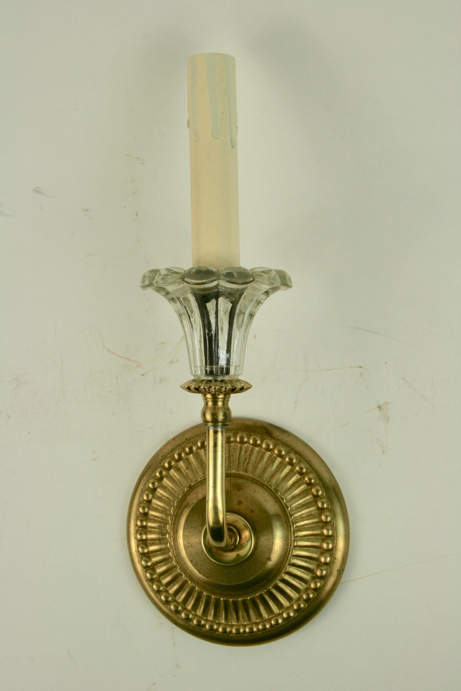 #2-1839, a pair of single arm dotted brass backplate glass tulip sconce.
Newly rewired.