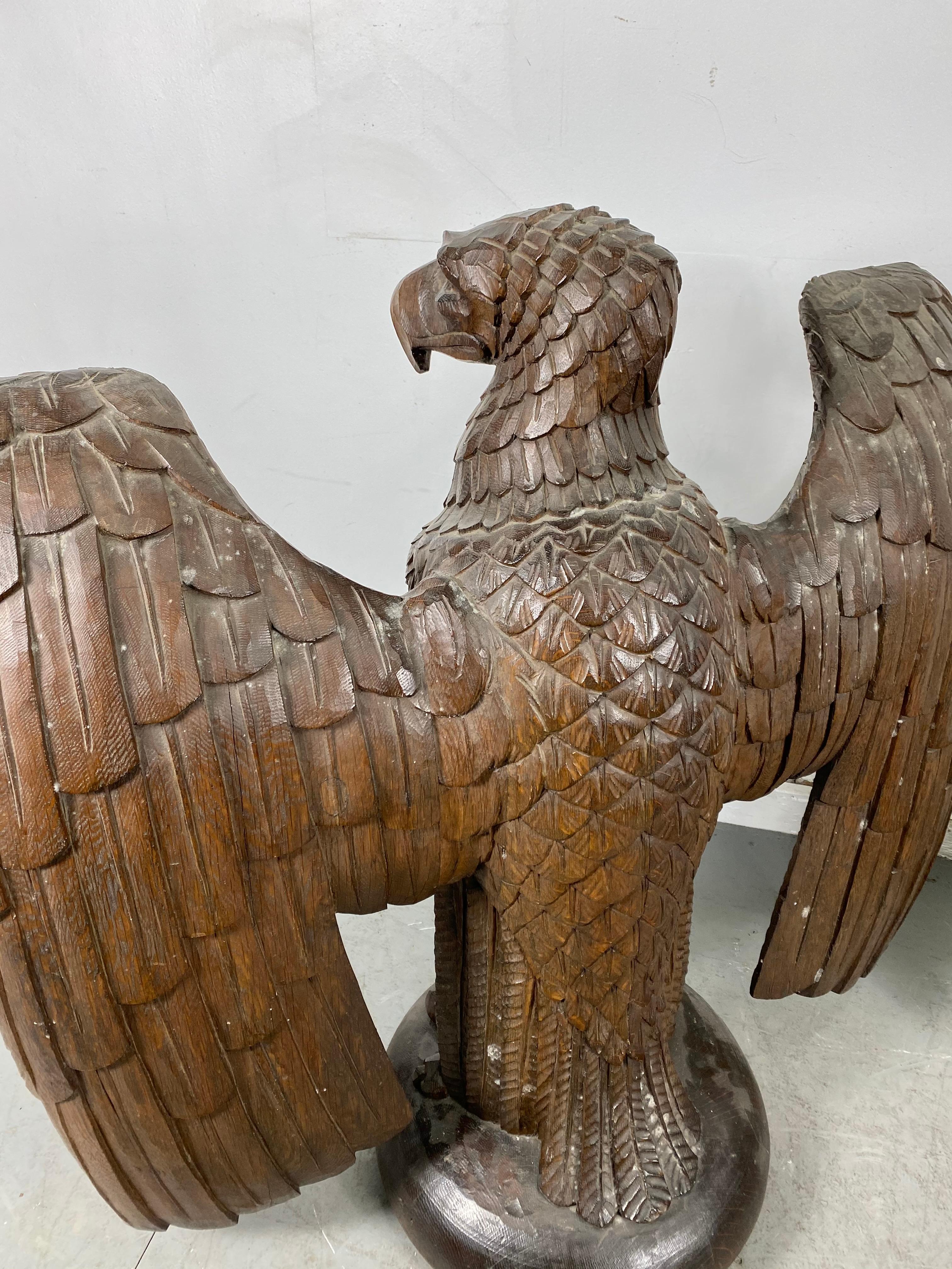 Pair of Turn of the Century Hand Carved Oak Eagles, Stylized In Good Condition In Buffalo, NY