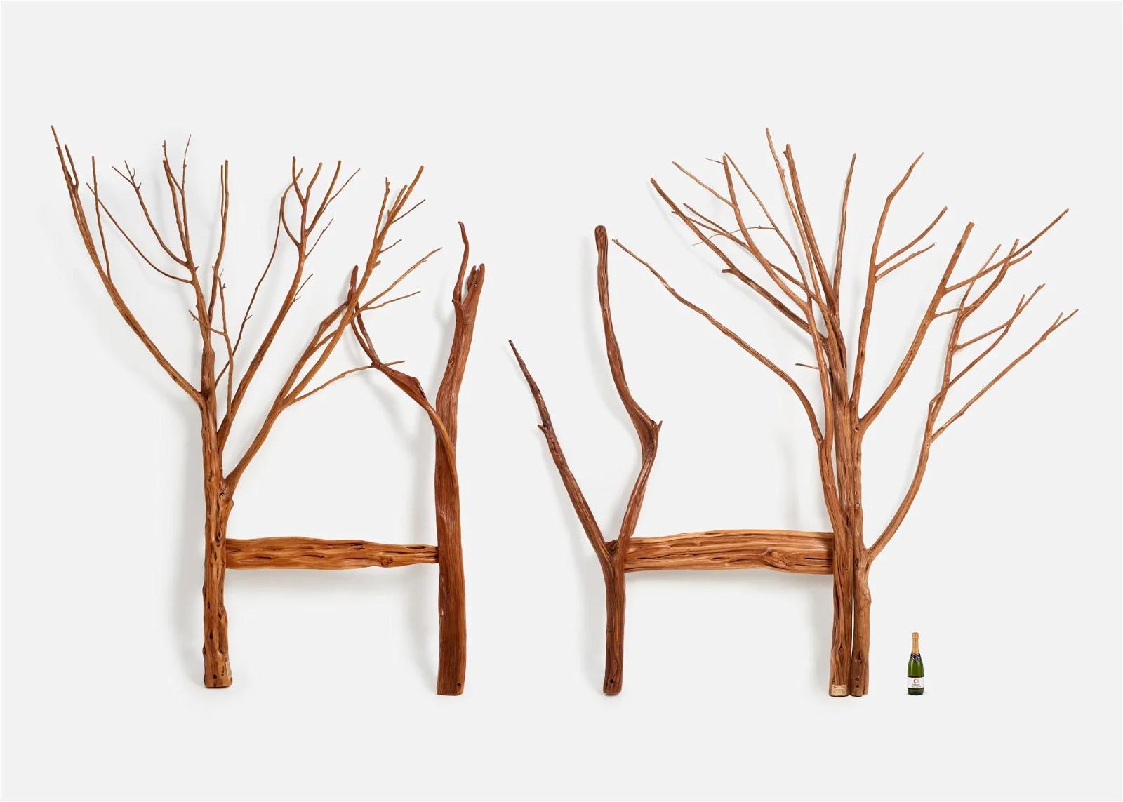 Pair of unique custom sculptural tree branch headboards designed by Rick Braun for Wood Merchant, a company in southwest Missouri. Each retaining the Ozarks area master craftsman's plaque. These bolt together in multiple pieces in order to move and