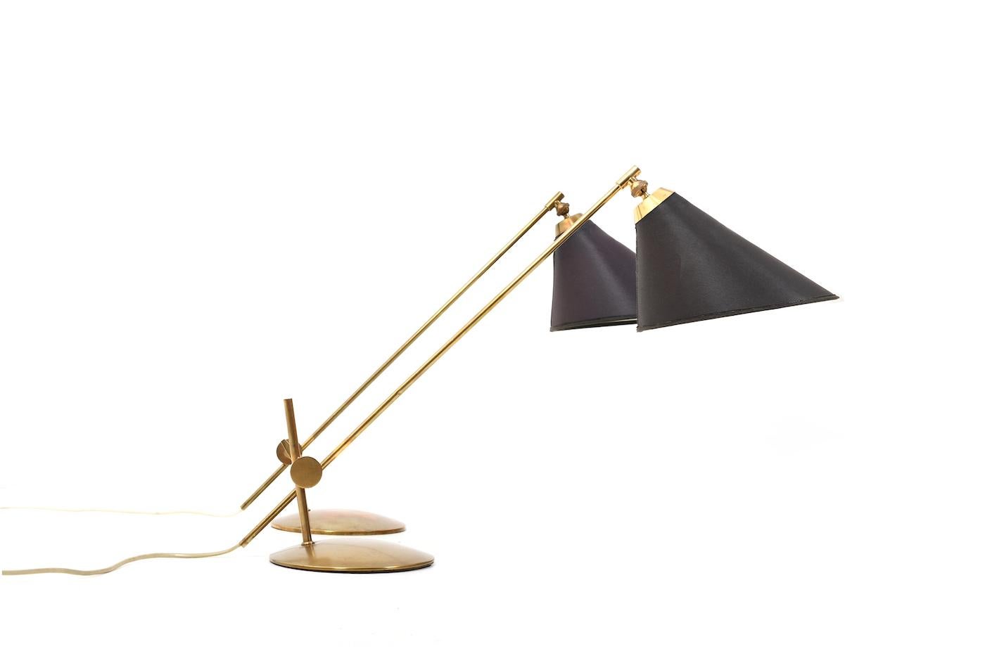 Pair of adjustable table lamps, designed esigned by Th. Valentiner 1950s. Made in brass by Poul Dinesen Denmark in 1950s. Model 
