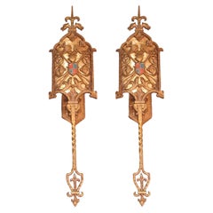 Quattro lampade molto lunghe (27") in bronzo di epoca spagnola 1920. Prezzo per coppia
