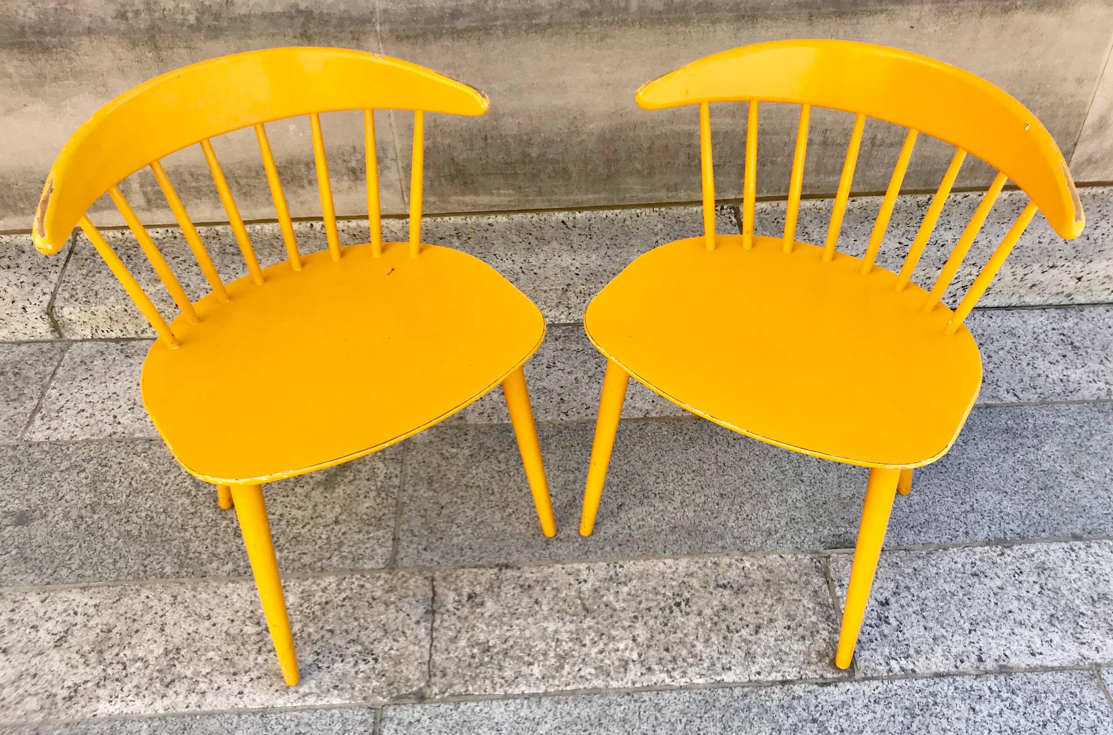 Fabulous pair of Danish modern painted birch side chairs from designed by Evjind Johansson for FDB Mobler.  These chairs were originally designed in the 1950s, and these chairs were produced in 1971. Stamped and dated on underside of seat. Great