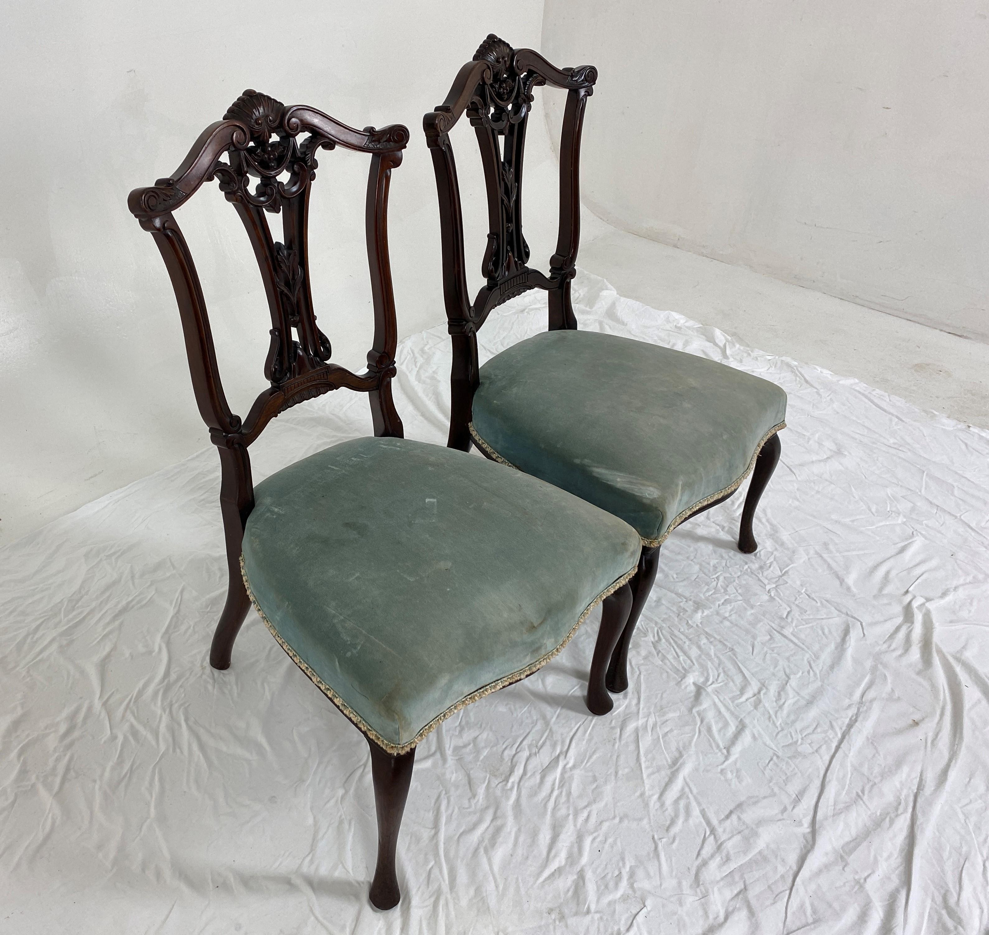 Pair Victorian carved walnut nursing chair upholstered seat, Scotland 1890, H766.

Scotland 1890
Solid Walnut
Original Finish
Shaped Carved open back
Upholstered seat with a light green color fabric
All standing on short cabriole legs
All