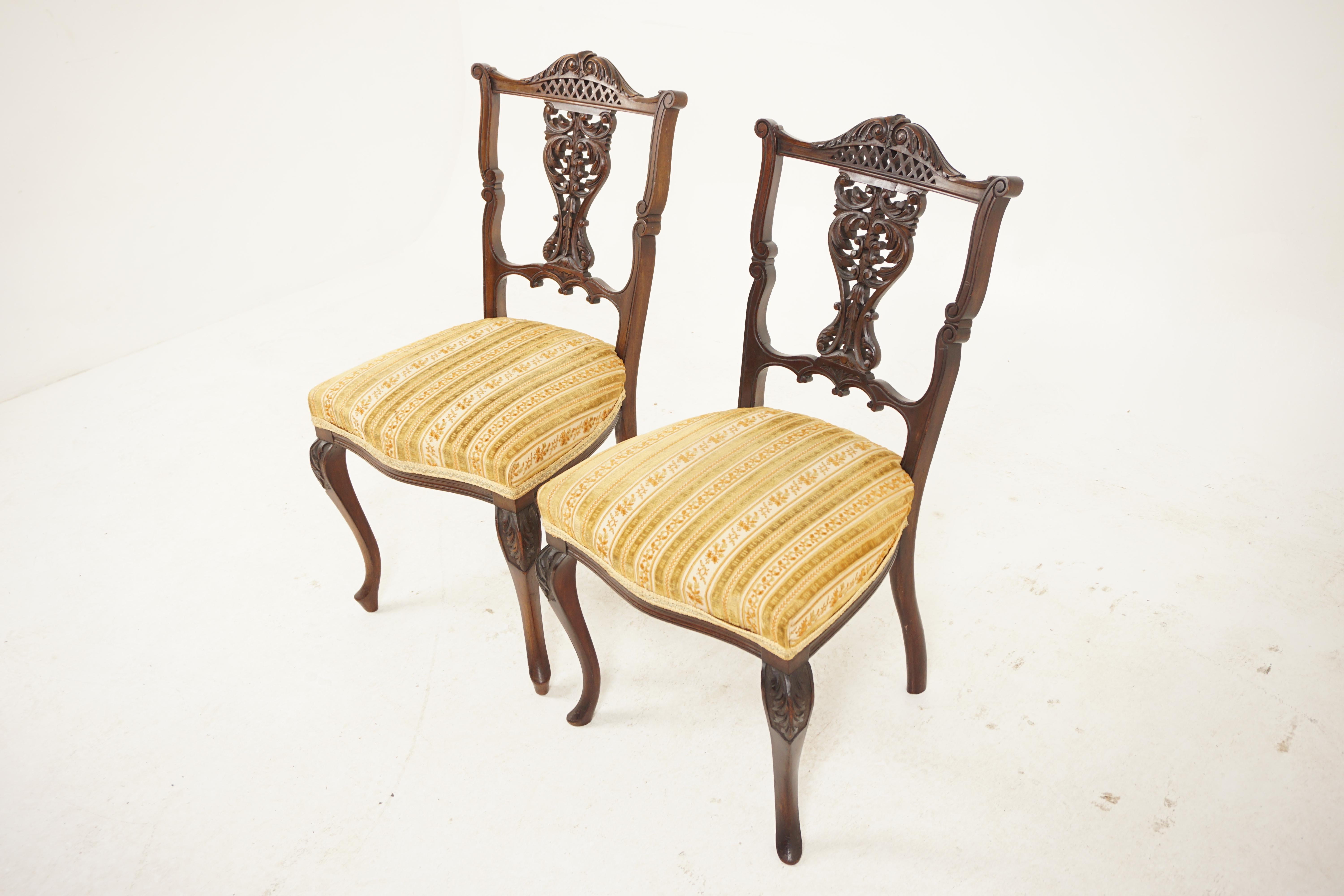 Pair of Victorian Carved Walnut Side Chairs, Occasional Chairs, Scotland 1890, H503

Scotland 1890
Solid Walnut
Original Finish
Having a quality carved top rail
Open pierced carved splat to the center, upholstered seat
Standing on carved cabriole
