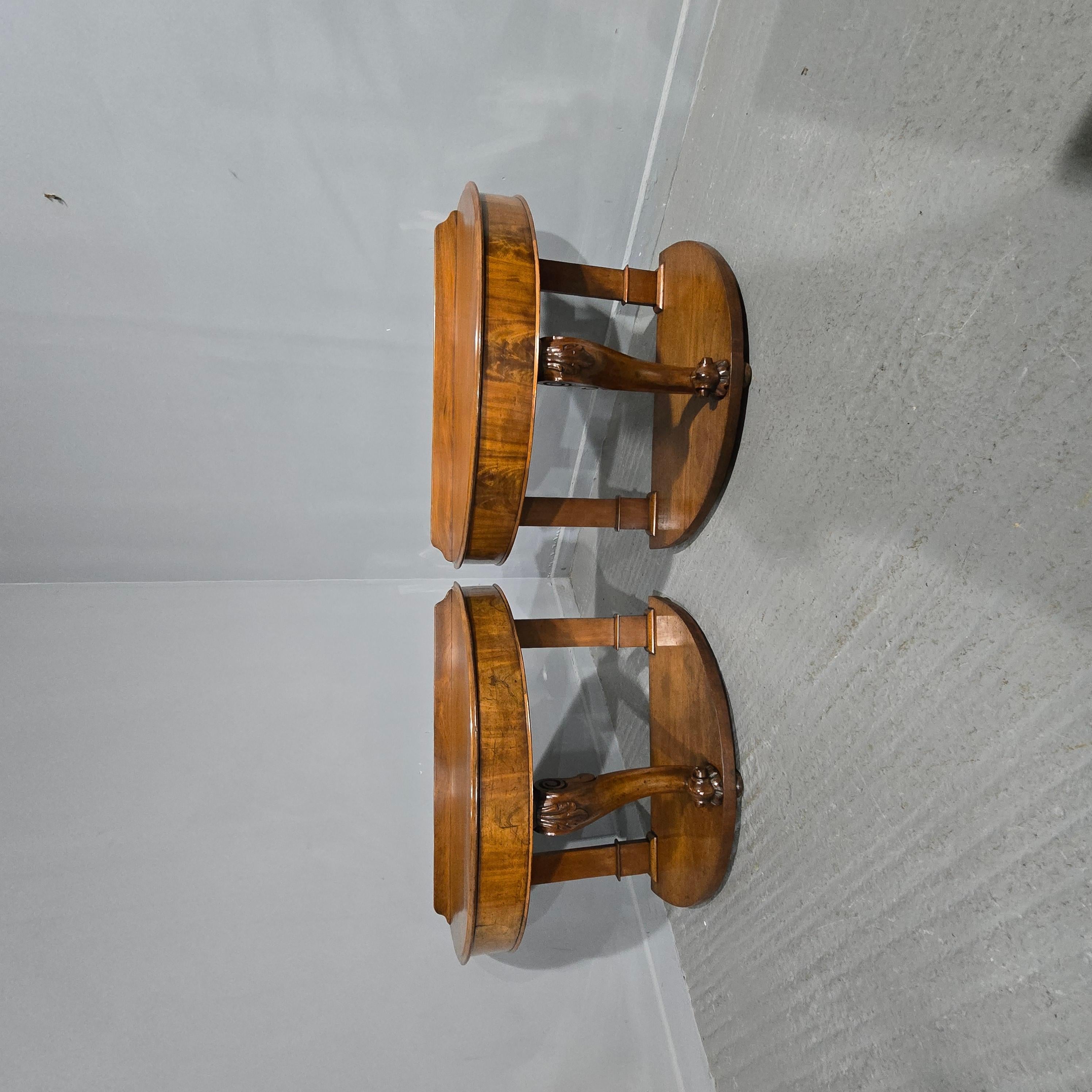 A very nice pair of Victorian demi loon console tables with single lions leg to the front, in overall very good original condition.

30