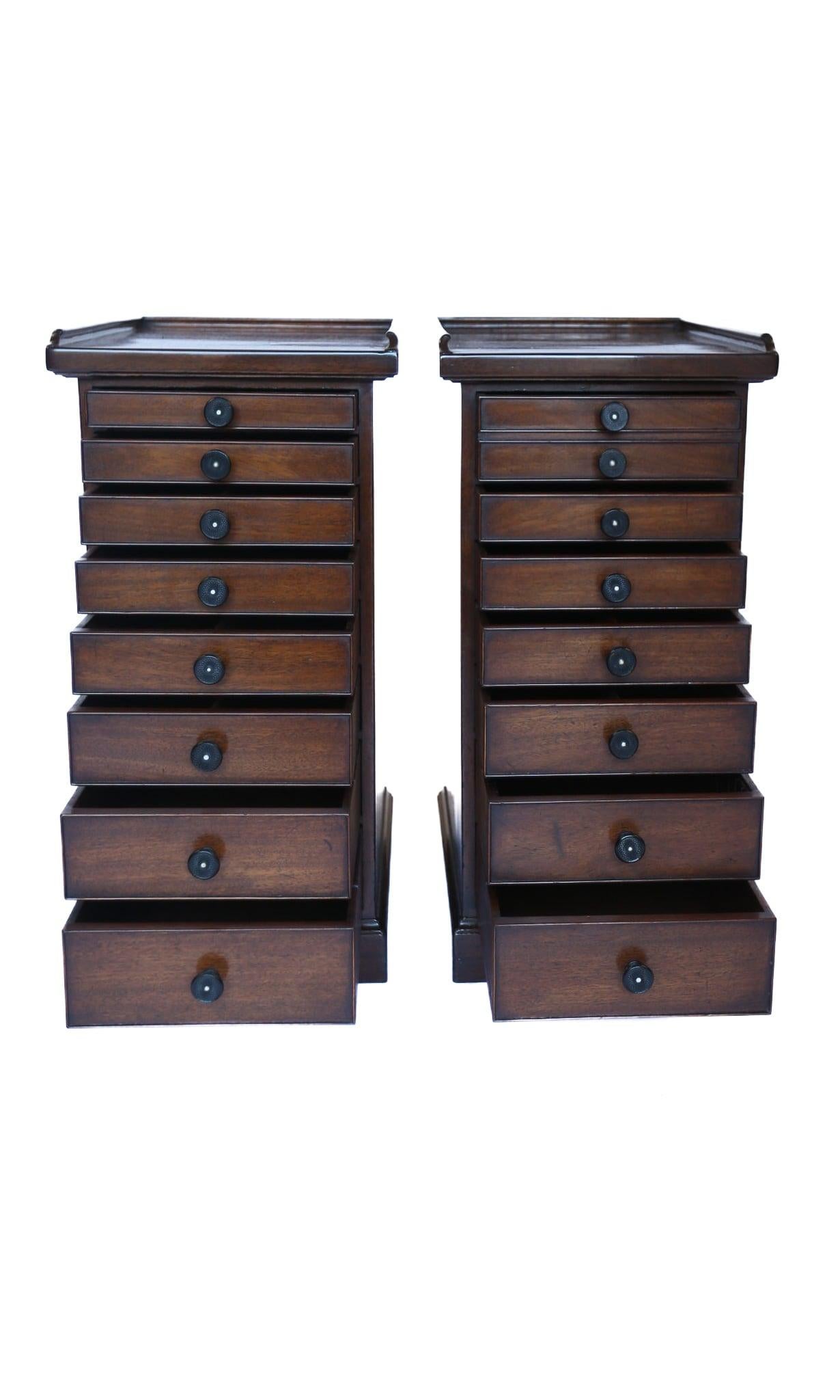 Pair Victorian Mahogany Multi Drawer Pedestal Chests
Tops with 3 quarter Gallery
One Chest With 8 Drawers, The other chest
With 7 drawers double drawer at top, 
Mahogany Drawer linings, 
Fine hand-Cut Dove Tails, 
Mahogany linings,
Ebony turned