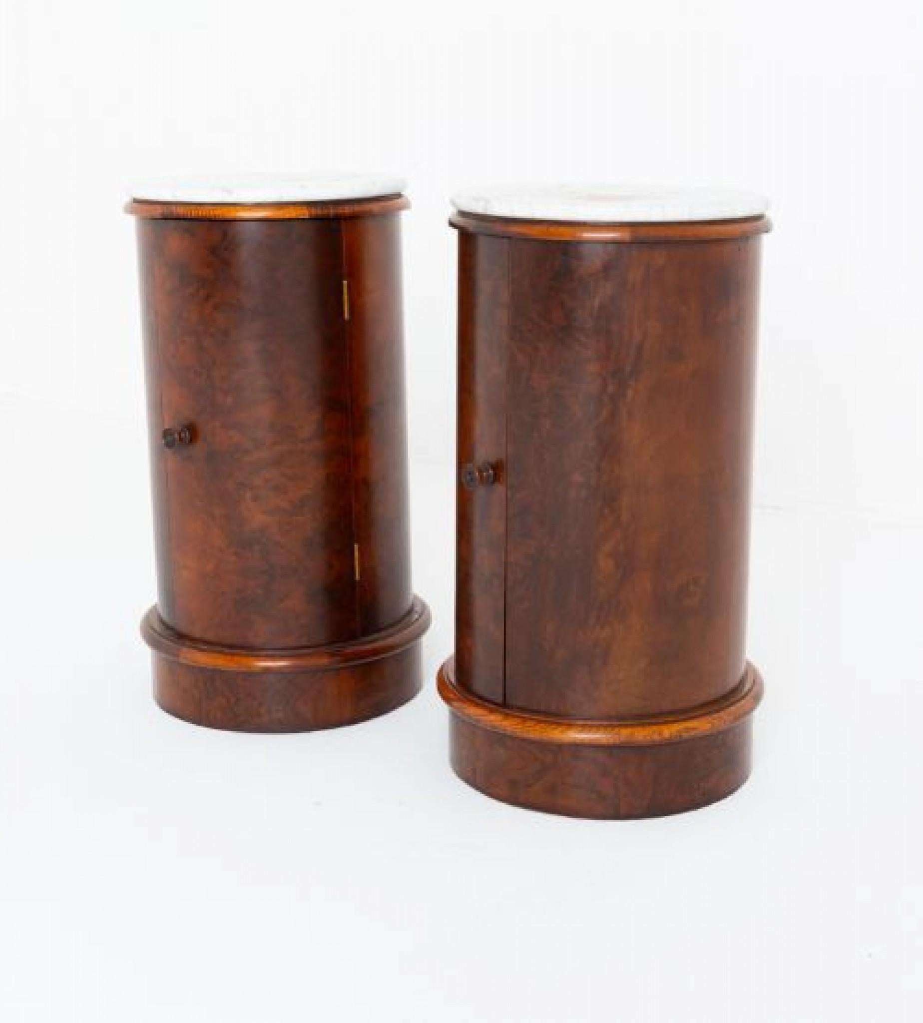 Wonderful pair of Victorian burr walnut pot cupboards.
These pot cupboards stand upon a plinth base.
Circa 1880
The pot cupboards being a true pair (left and right hand doors)
Featuring wonderful figured walnut veneers and finished with a marble