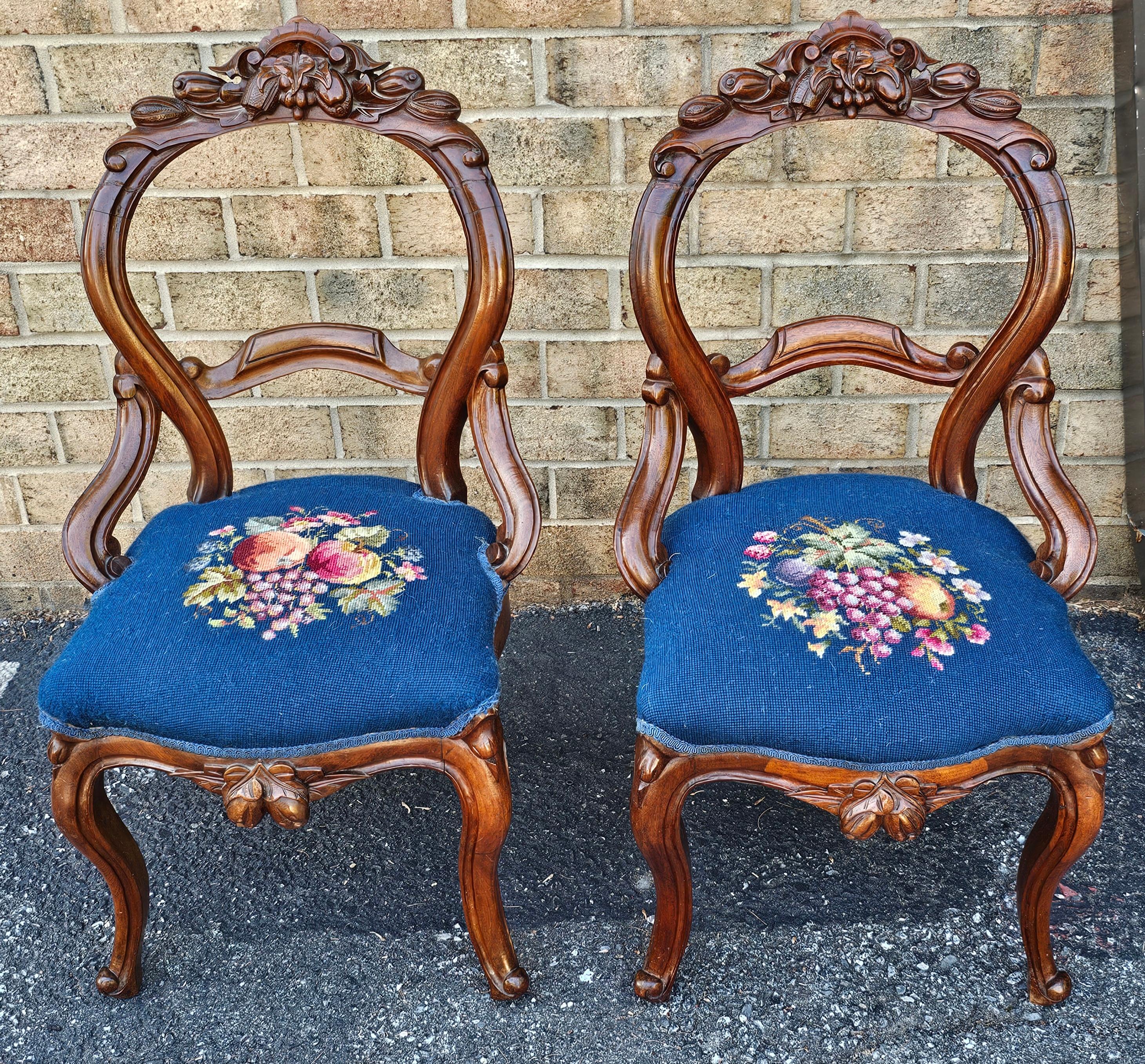 American Pair Victorian Rococo Style Walnut and Needlepoint Upholstered Side Chairs For Sale