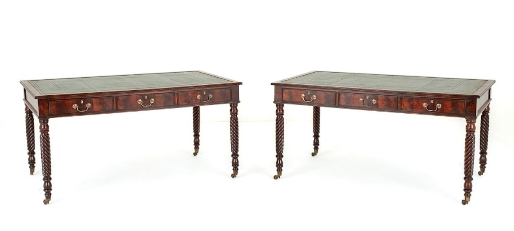 A Good Pair of Mahogany Writing Tables.
These Writing Tables Feature Turned Legs with Barley Twist Decoration and Brass Castors.
Circa 1850
Each of the Tables Having 3 Mahogany Lined Drawers With Brass Swan Neck Handles.
The Tops of the Tables